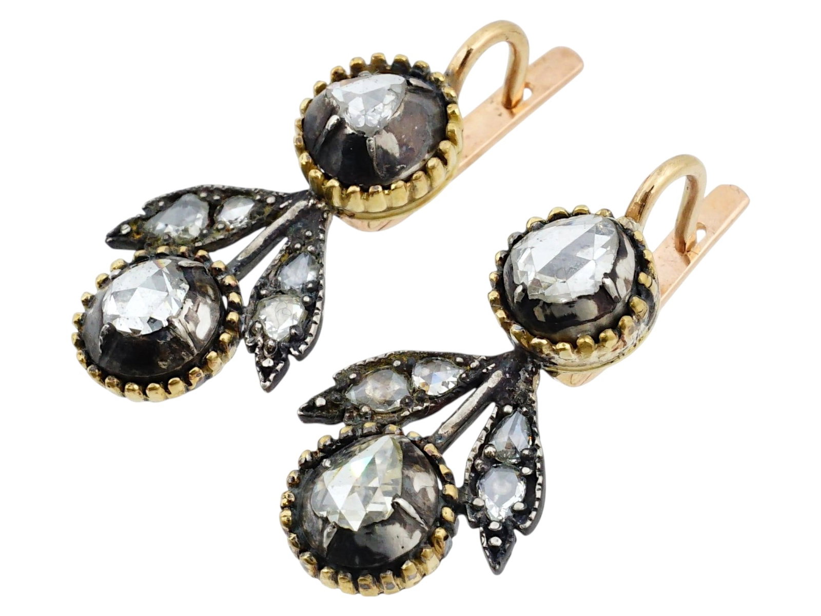 RUSSIAN GOLD AND SILVER EARRINGS WITH DIAMONDS: A pair of Russian silver and 14K gold lever-back earrings. Chandelier-style piece set with six various size diamonds each. Hallmarked with 56 gold standard and makers marks. Collectible Fine Jewelry F