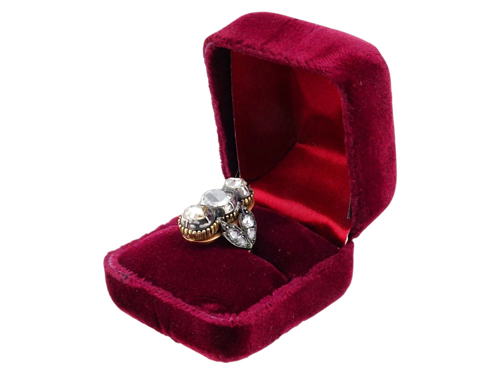 RUSSIAN 18K GOLD DIAMOND NAVETTE RING: A Russian rose gold statement ring. An elegant three-diamond navette in white and yellow gold framing is flanked with smaller diamonds modeled as petals. Hallmarked with 56 gold standard and makers ma