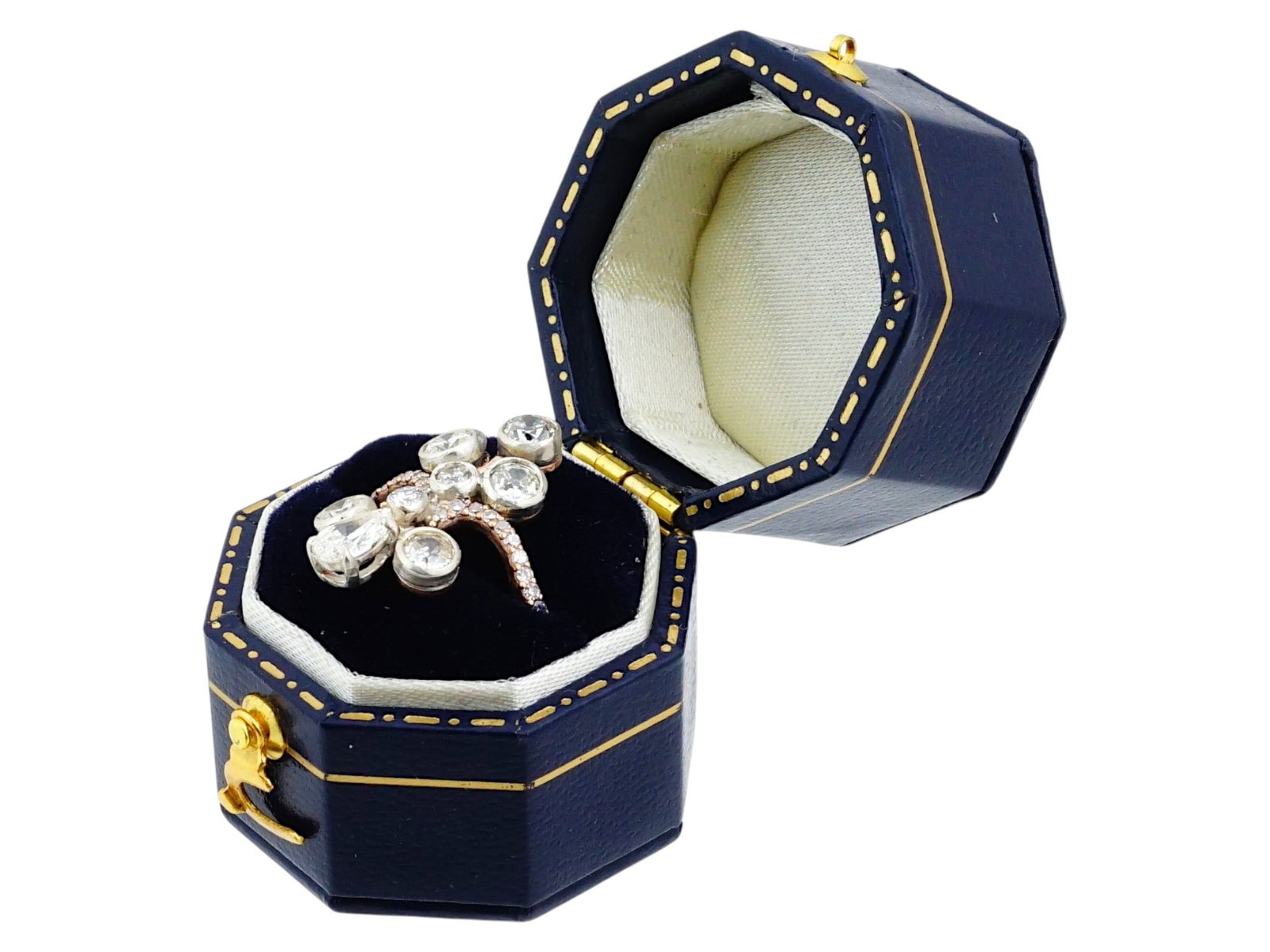 RUSSIAN 18K GOLD DIAMOND STATEMENT RING: A Russian yellow gold statement ring. An elegant Art Nouveau-style piece set with six round-cut and a single marquise diamonds. The curved band itself is also garnished with diamonds. Hallmarked with 