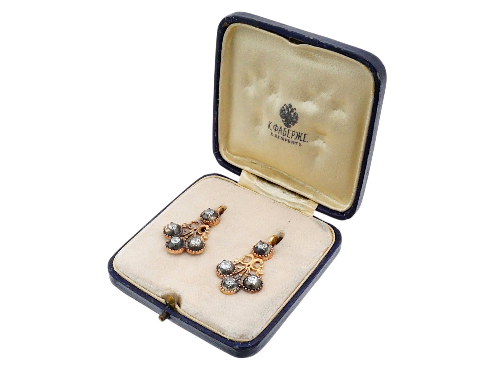 RUSSIAN GOLD AND DIAMOND CHANDELIER EARRINGS: A pair of Russian rose and yellow gold lever-back earrings. Chandelier-style piece set with four round-cut diamonds each. Hallmarked with 56 gold standard and makers mark. Total Weight: 7.53 g. The pa