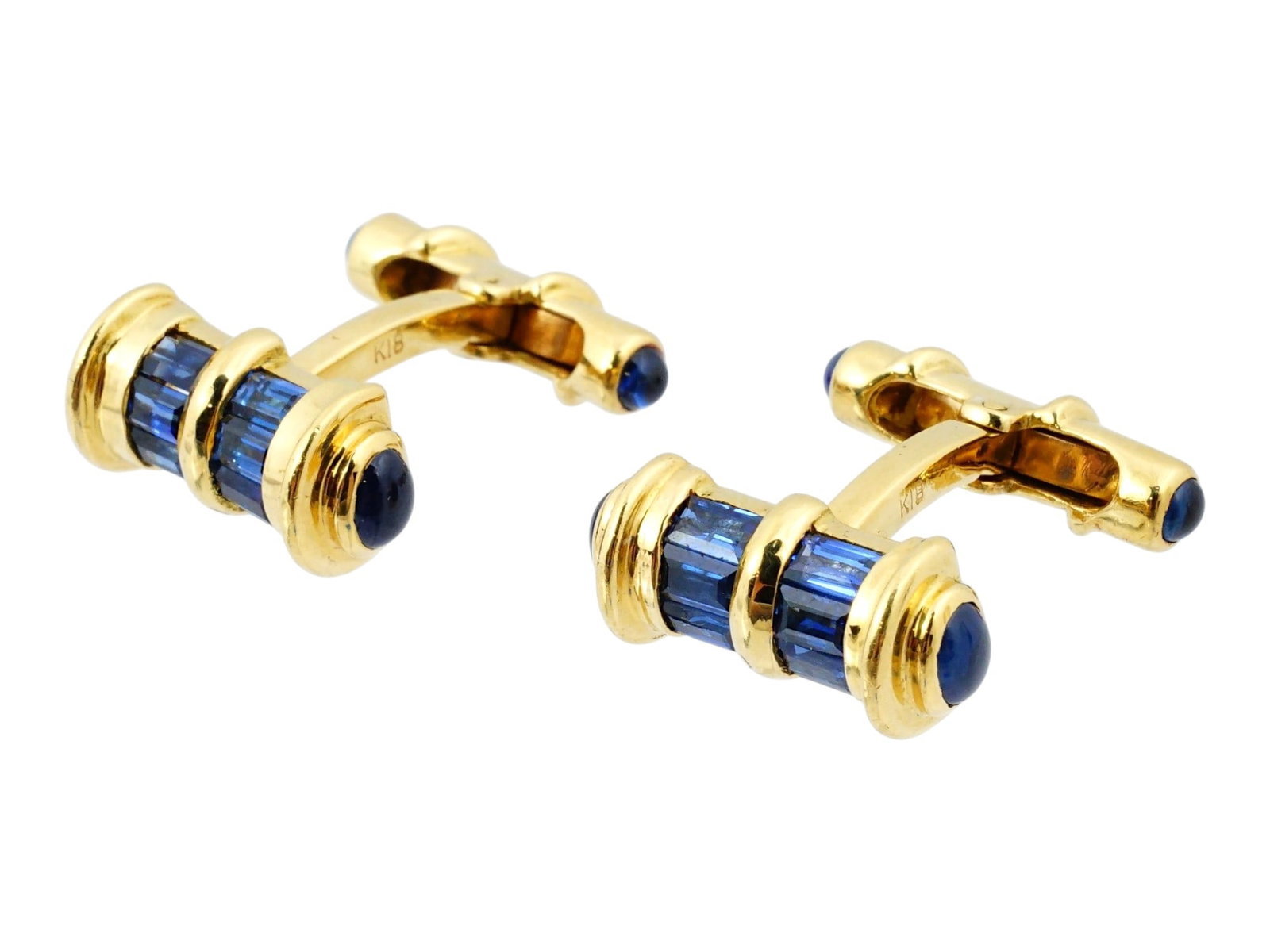 VINTAGE DAVID WEBB 18K GOLD JEWELED CUFFLINKS: A pair of vintage 18K yellow gold whaleback cufflinks by David Webb. Embellished with cobalt and baby blue crystals. Marked Webb, 18K on the backing. Total Weight: 14.17 g. Vintage Jewelry And Accesso