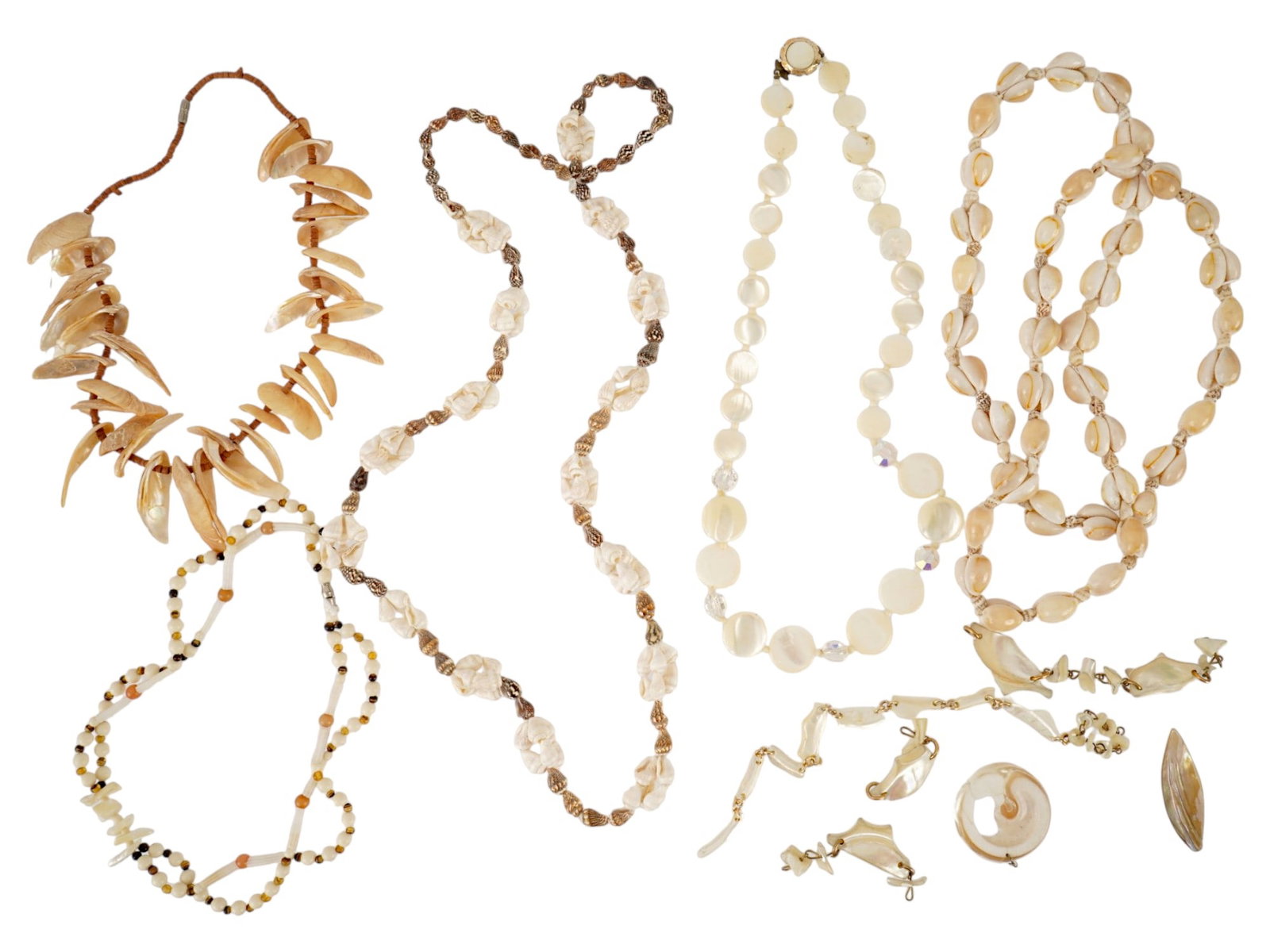 COSTUME JEWELRY SHELL AND MOTHER OF PEARL NECKLACES: A collection of costume jewelry sea themed necklaces. The lot contains necklaces in various designs, consisting of alternating shells of different types and sizes and mother-of-pearl in light shades. 