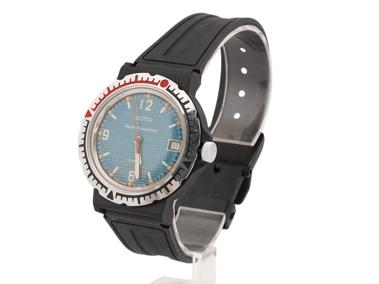 SOVIET ERA VOSTOK KOMANDIRSKIE MILITARY WRIST WATCH: A Soviet-era Vostok Komandirskie 17 jewels military wristwatch. Circa the late 1970s to 1980s. A blue enameled dial with white Arabic numerals. The wristwatch was produced at the Chistopol watch facto