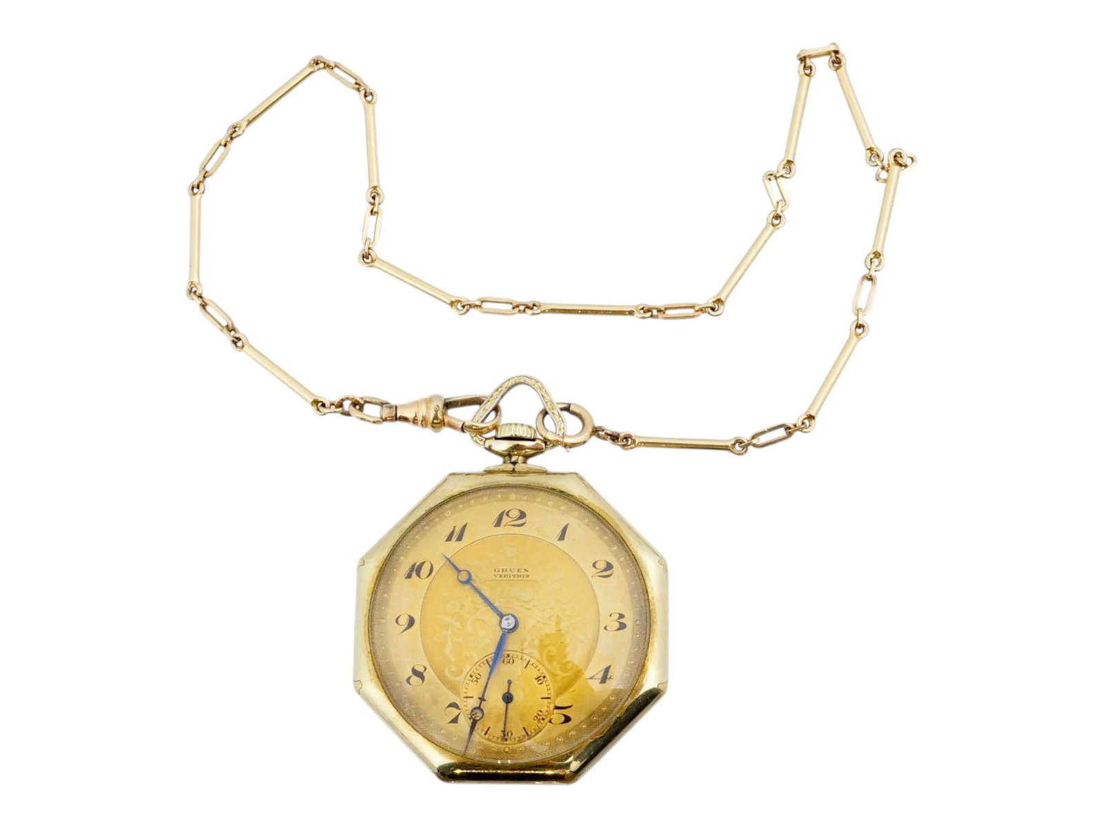 14K GOLD FILLED GRUEN VERITHIN POCKET WATCH W CHAIN: A Gruen Verithin pocket watch. The ware features an octagonal 14K gold filled case housing a gold tone dial with raised Arabic numerals and a dedicated sub seconds register at the six o clock position