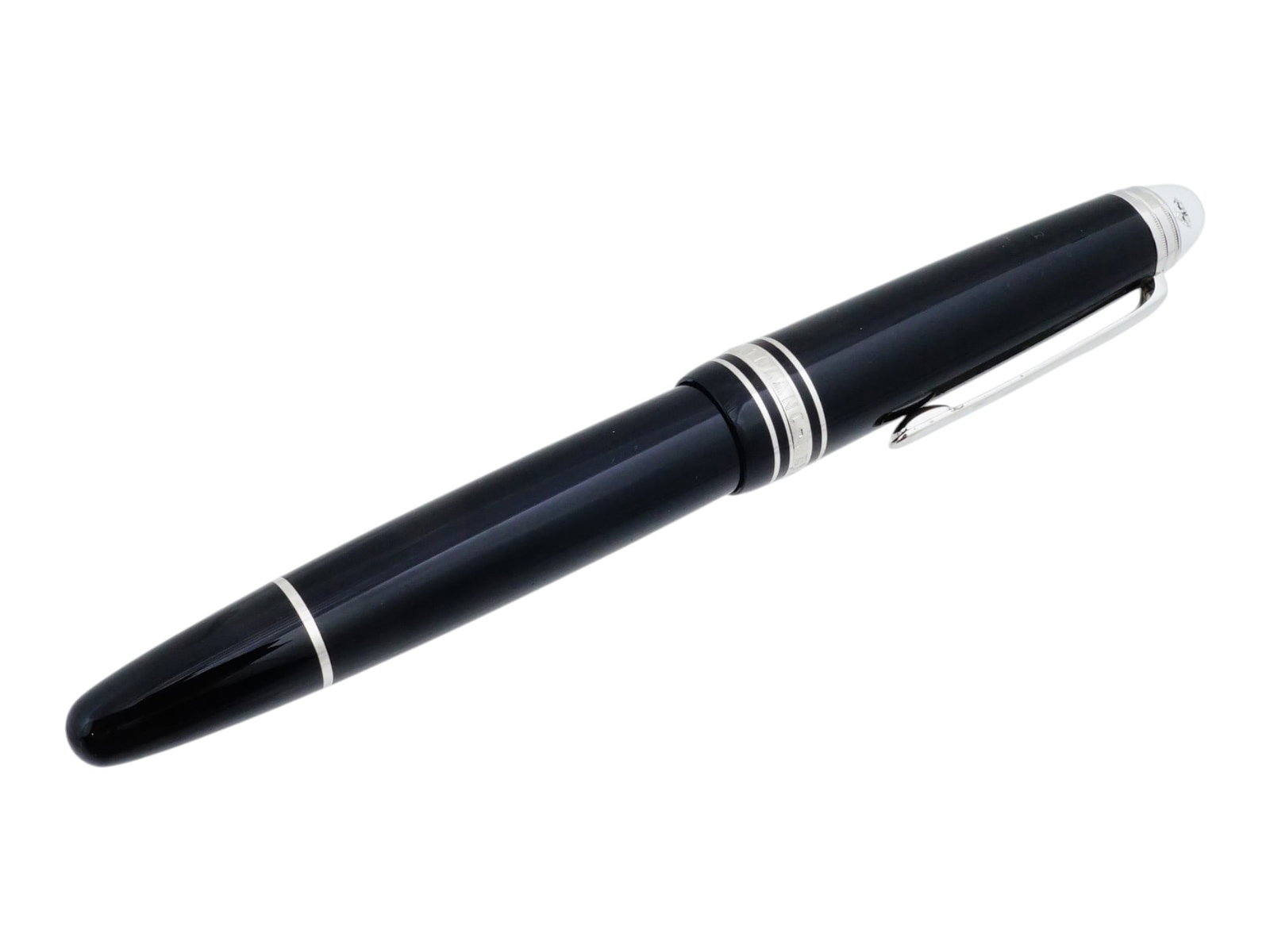 VINTAGE MONTBLANC MEISTERSTUCK BALLPOINT PEN: A vintage ballpoint pen by Montblanc, Meisterstuck collection. The barrel and cap are crafted from black precious resin. The pen is adorned with embossed platinum rings and a platinum-plated clip. Col