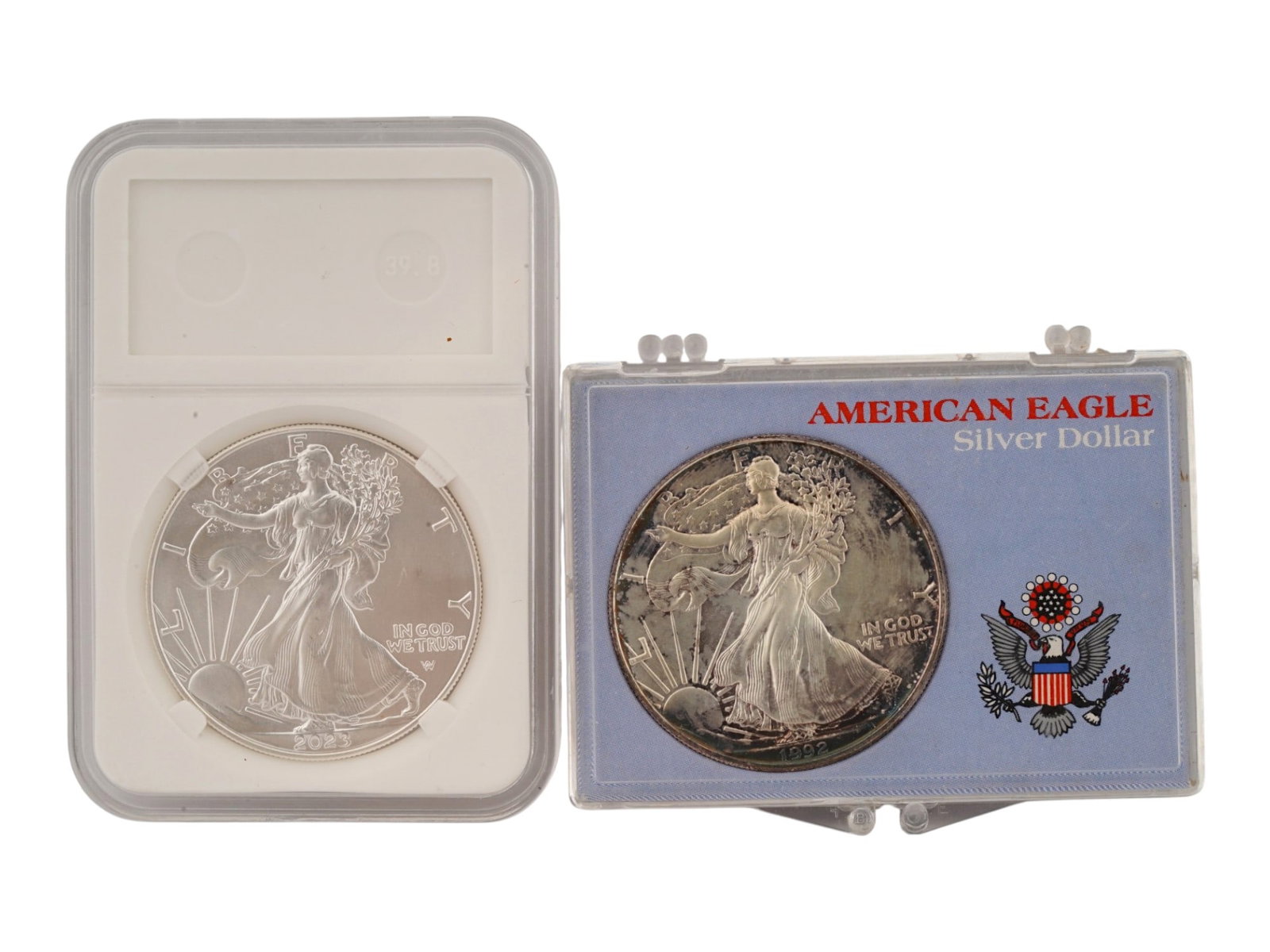 TWO MODERN AMERICAN SILVER EAGLE BULLION GRADED COINS: A pair of modern American Silver Eagle bullion coins, the official silver bullion issues of the United States struck in .999 fine silver. The group includes a modern 2023 Type 2 Silver Eagle featuring