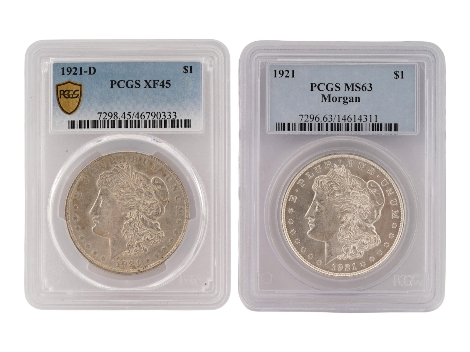 TWO VINTAGE AMERICAN 1921 MORGAN SILVER GRADED DOLLARS: A pair of vintage American 1921 Morgan Silver Dollars certified by the Professional Coin Grading Service, representing the final year of the historic Morgan Dollar series before the introduction of th
