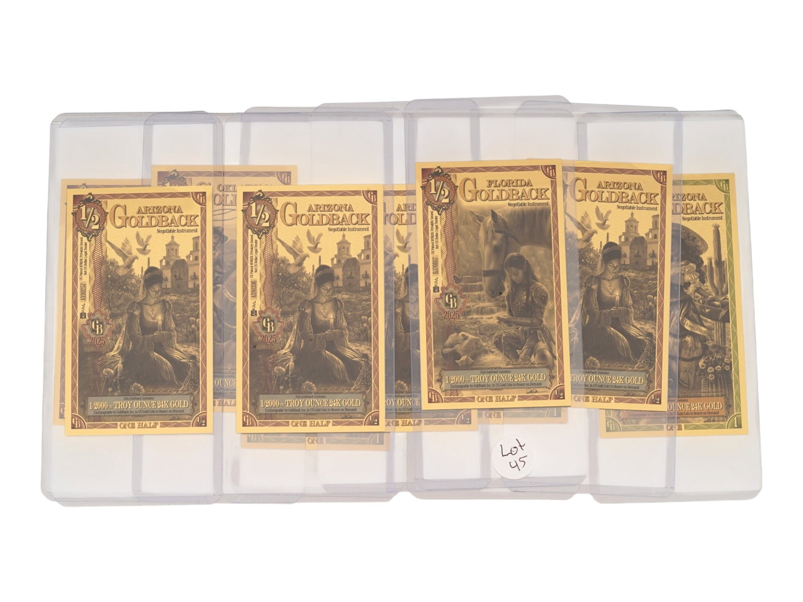 COLLECTION OF TEN AMERICAN GOLD BACK BANKNOTES: A collection of ten American goldbacks, a local unit of currency, made from thin polymer banknotes coated with real 24 karat gold. The collection includes four 1/2 GB Arizona, three 1 GB Arizona, two 