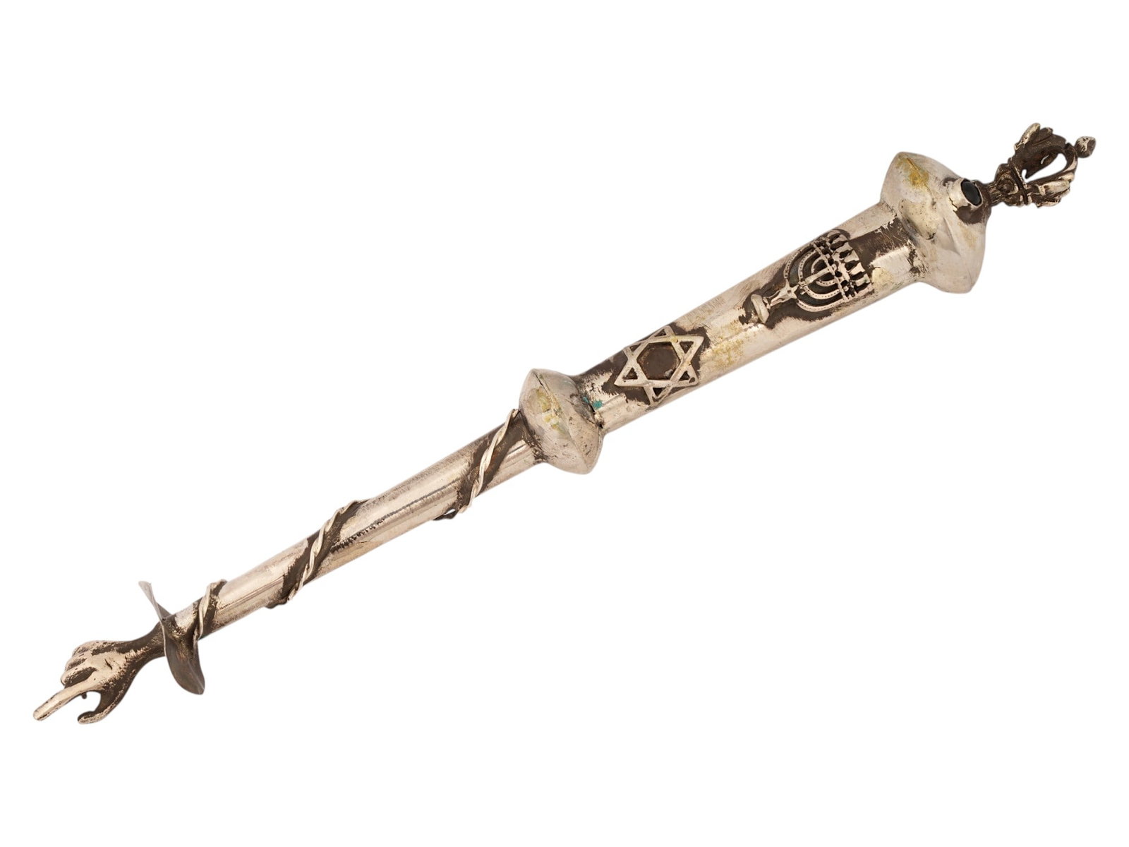 RUSSIAN 84 SILVER TORAH POINTER WITH MENORAH: A Russian silver Torah pointer, or yad, features a tapering shaft accented with a spiraling wire motif. The terminal is cast in the form of a hand with a pointing index finger, while the opposite end 