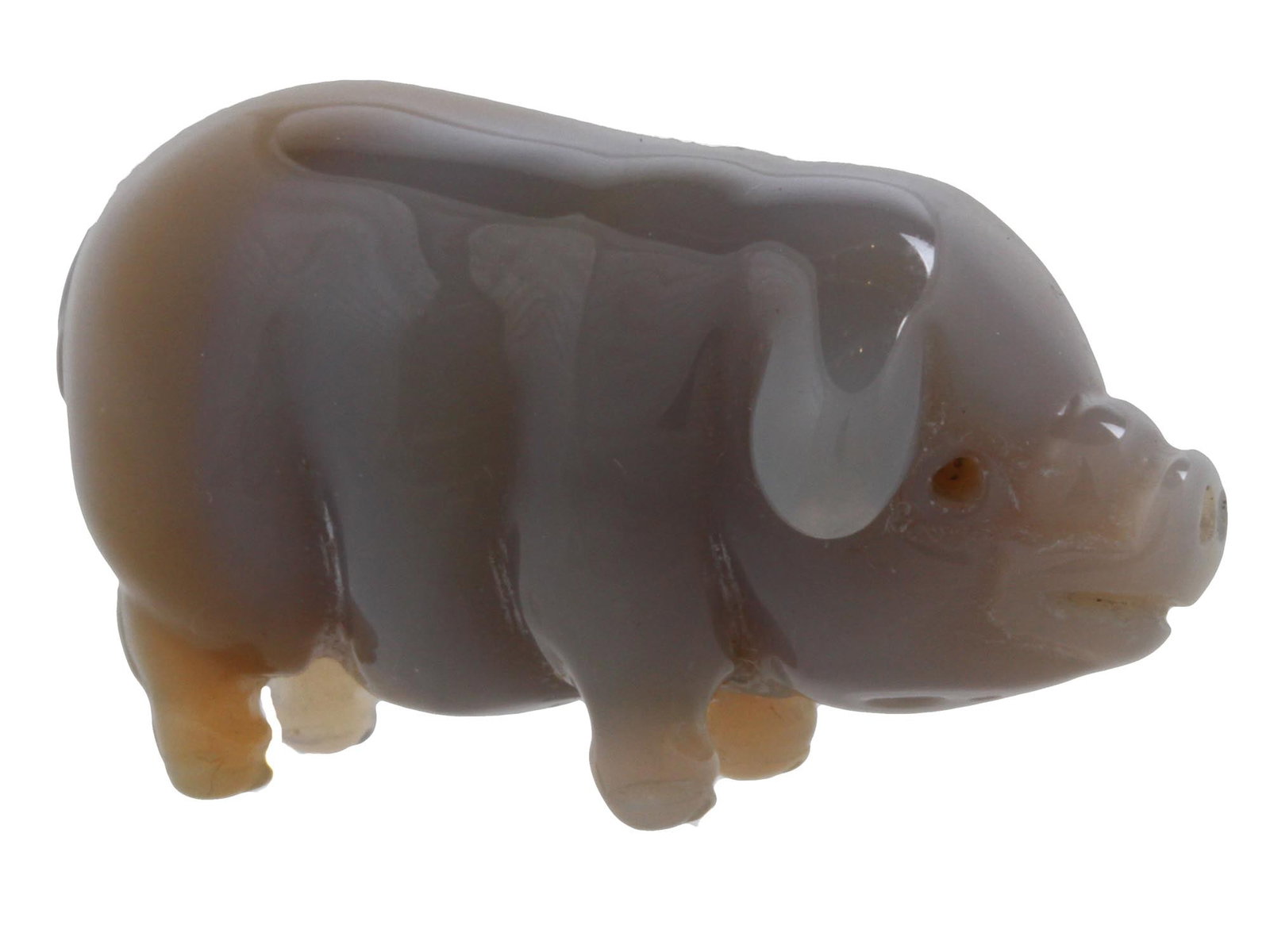 RUSSIAN HAND CARVED AGATE FIGURINE OF A PIG: A Russian hand carved agate figurine of a pig. Stone eyes are missing. Russian Carved Stone Jewelry Collectibles. THIS LOT IS ELIGIBLE FOR A 30-DAY UNCONDITIONAL RETURN FROM THE DATE OF THE SALE.