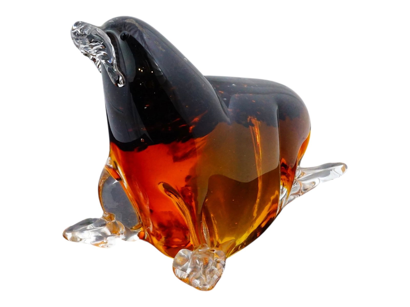 MODERN ITALIAN MURANO GLASS ART SCULPTURE OF A SEAL: A modern Italian Murano glass art sculpture depicting a seal. The hand-blown composition features a rich amber-toned body accented with darker highlights and contrasting clear glass flippers. Contempo