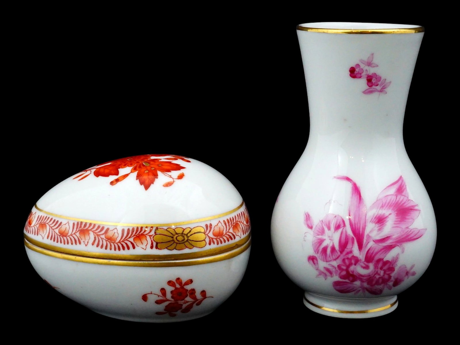VINTAGE HUNGARIAN PORCELAIN VASE AND TRINKET BOX: Two vintage Hungarian hand-painted porcelain pieces, showcasing floral decoration and gilt detailing. The collection includes an egg-form trinket box in the celebrated Chinese Bouquet Rust pattern, de