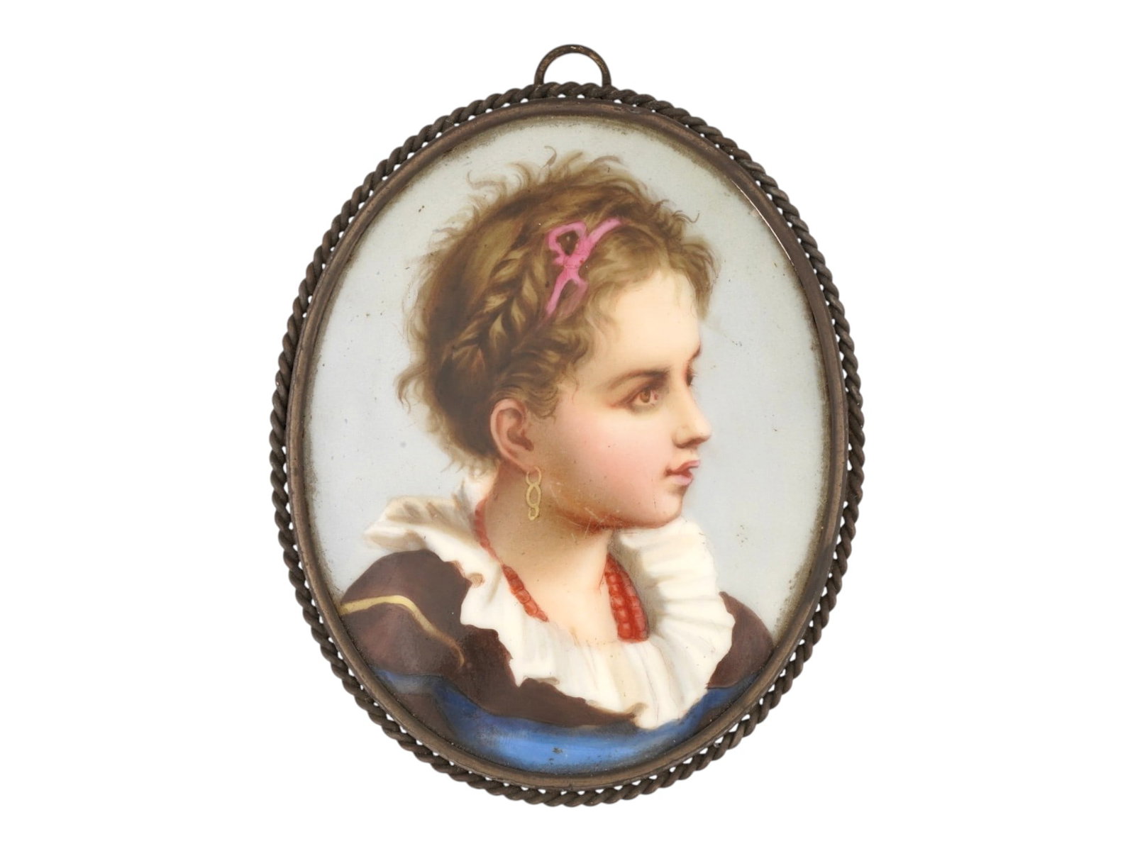 ANTIQUE GERMAN HAND PAINTED PORCELAIN PLAQUE: An antique German hand painted porcelain plaque. Presumably by KPM, Berlin. The oval portrait depicts a little girl in the right profile with a gold earring and a pink ribbon in her hair. It is housed