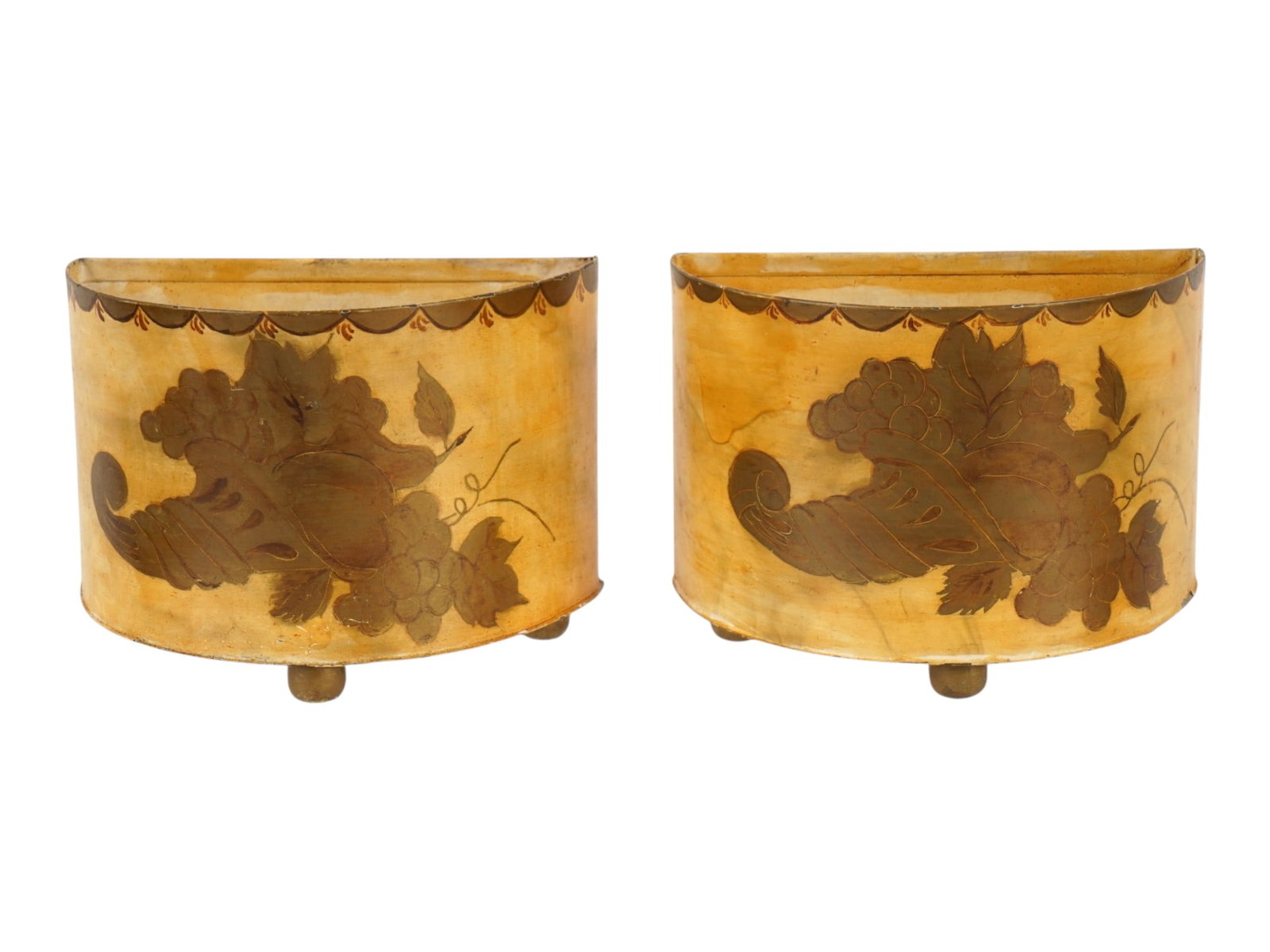 PAIR OF FRENCH ART NOUVEAU MANNER ETCHED PLANTERS: A pair of vintage French Art Nouveau style planters. The pieces are adorned with etching and engraving. The semicircular walls are decorated with floral motifs, including a cornucopia and bunches of g