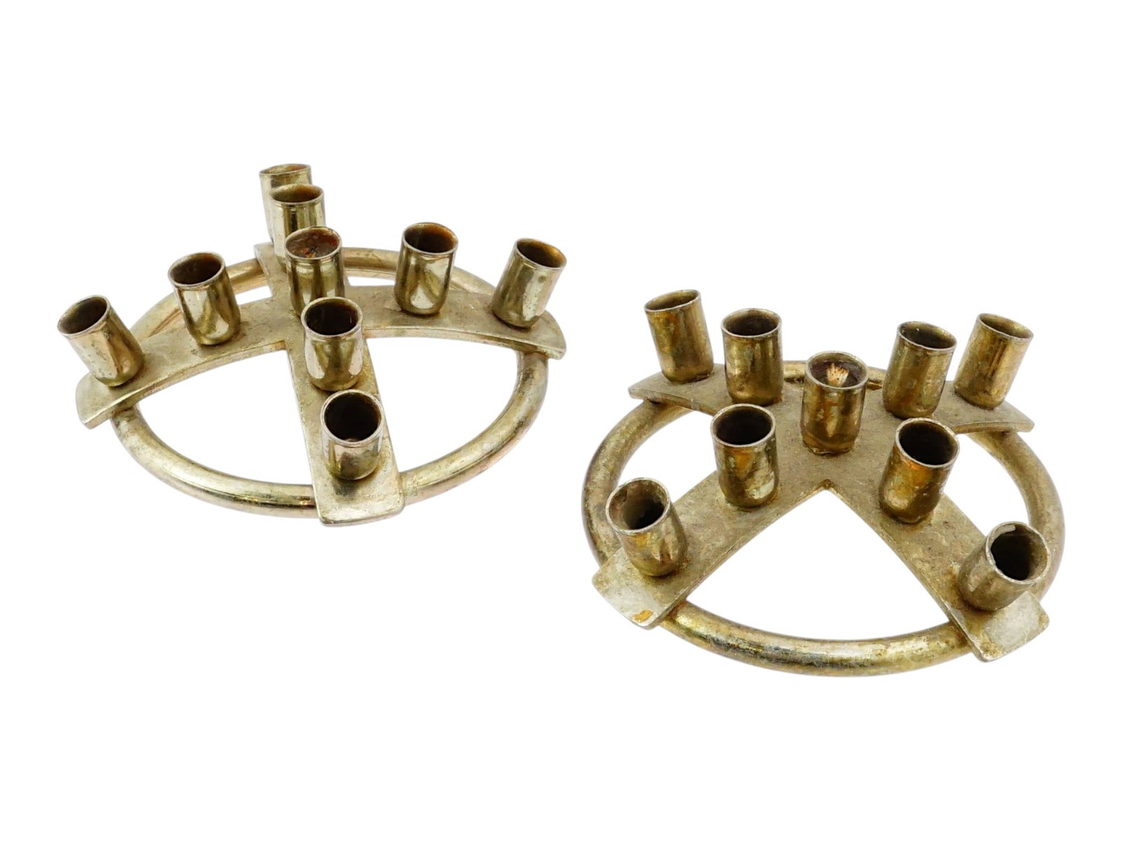 PAIR OF VINTAGE SCANDINAVIAN BRASS CANDLESTICKS: A pair of vintage Scandinavian brass candlesticks designed to hold nine slim tiny taper candles. Executed in the clean and elegant modern Danish style of the 1960s. Attributed to Scandia Design of Hel