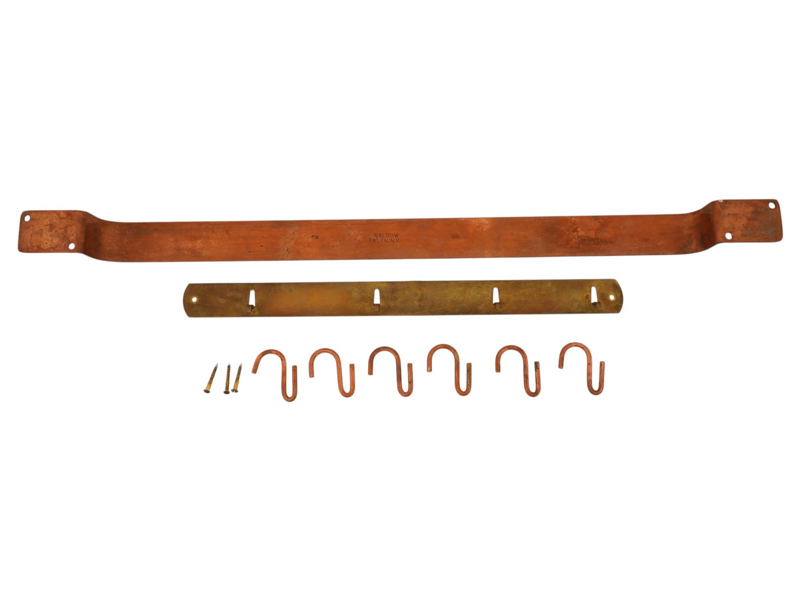 VINTAGE WALDOW BROOKLYN COPPER POT HOLDER: A vintage Waldow Brooklyn copper pot holder consisting of two fasteners, hooks, and screws. A highly regarded piece of American cookware produced by the Thomas Bruno Waldow Company in Brooklyn, New Yo