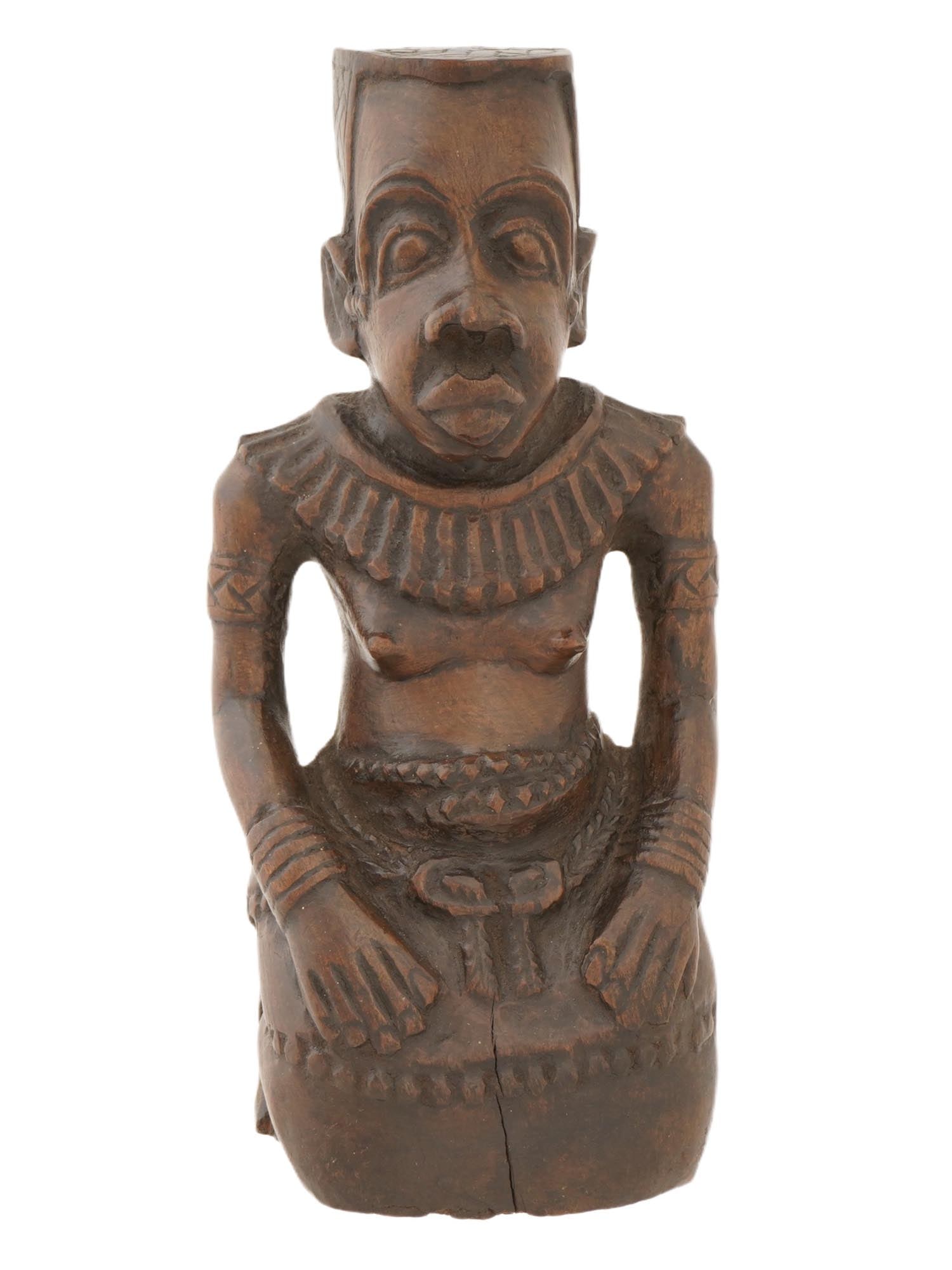 AFRICAN CONGO HAND CARVED WOODEN FEMALE FIGURINE: An African hand carved wooden seated female figurine from Congo. The figure features a large head with a shaved hairline that frames the forehead. Adorned with carved jewelry, reflecting the prestigio