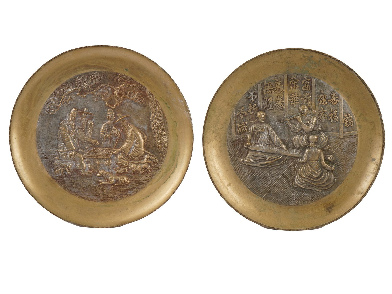 PAIR OF VINTAGE CHINESE BRONZE RELIEF WALL PLATES: A pair of matching vintage Chinese cast bronze wall plates. Dated mid-20th century. Depicting relief multi-figure scenes, elders playing mahjong, musicians. Unmarked. Collectible Oriental Asian Decor,