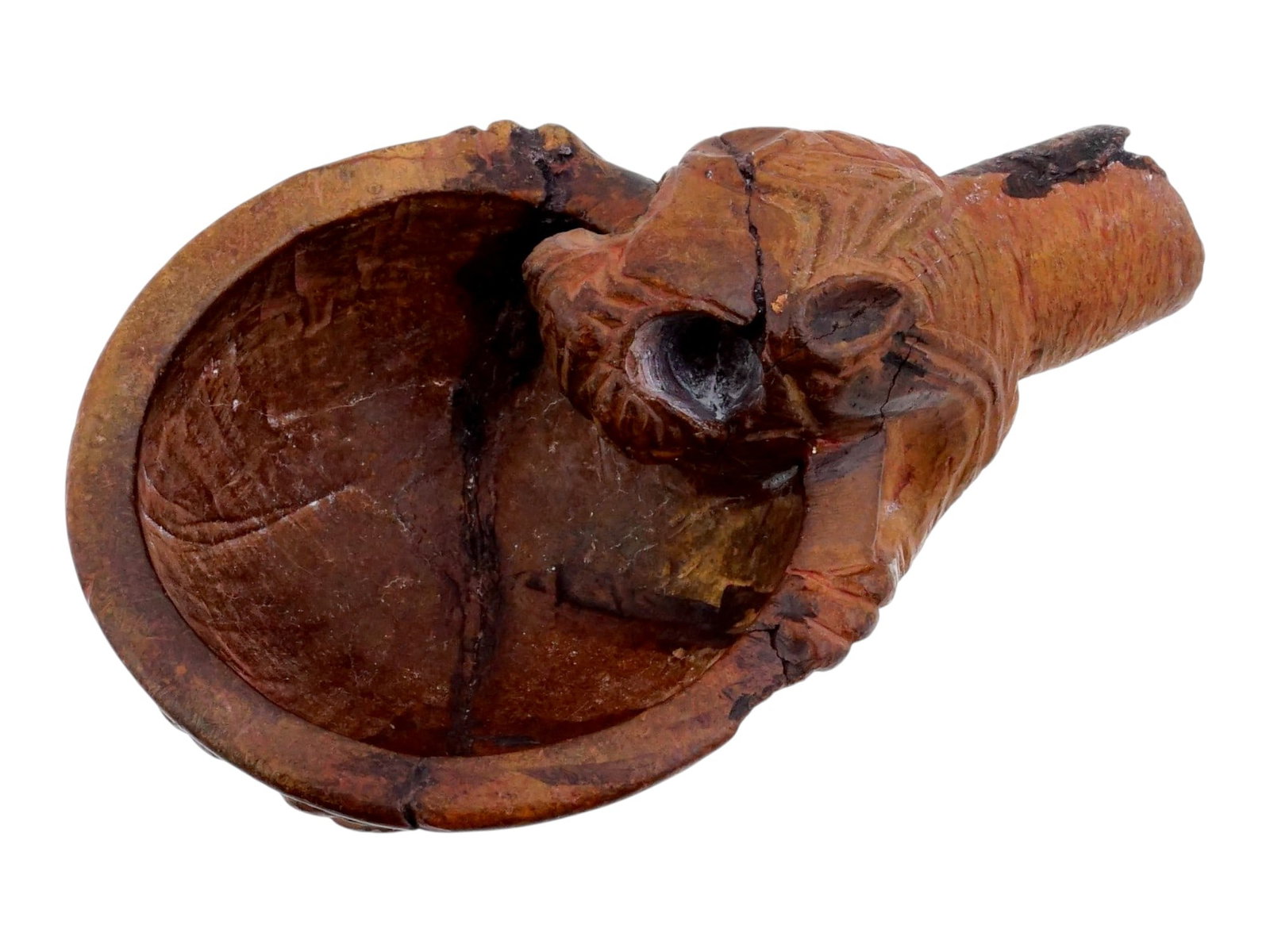 ANCIENT NEAR EASTERN LIBATION LION HEADED BOWL: An ancient libation bowl often referred to as a lion-headed bowl. The vessel features a shallow bowl that transitions into a tubular spout surmounted by a stylized lion head figure. A libation bowl ri