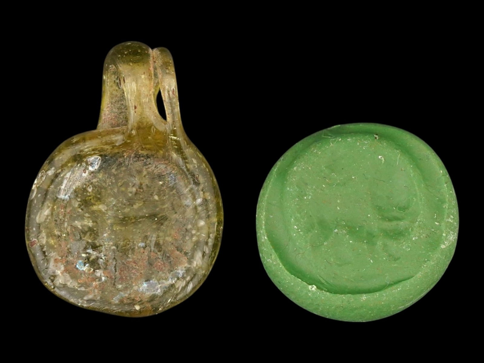 ANCIENT ROMAN GLASS MEDALLION LION WITH CRESCENT MOON: An ancient Roman glass cameo medallion, dating from 100 to 300 AD. Features an astrology image of a lion with a crescent moon upper. The craftsmanship highlights the artistry of Roman glassmakers, who