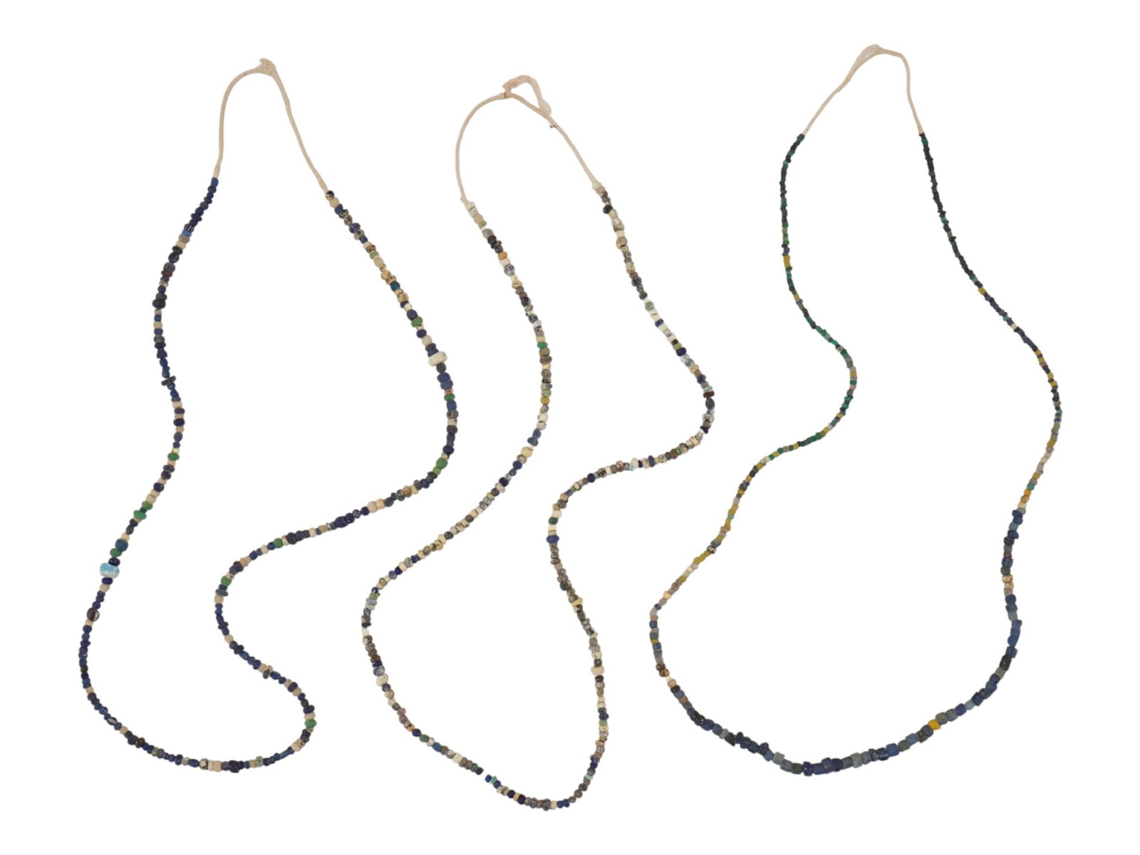 GROUP OF THREE ANCIENT HOLY LAND GLASS BEAD NECKLACES: A group of three ancient Holy Land glass bead necklaces dating to the Roman period, circa 100 to 300 AD. Composed of colorful ancient glass beads in varied shapes and tones, the necklaces reflect the 