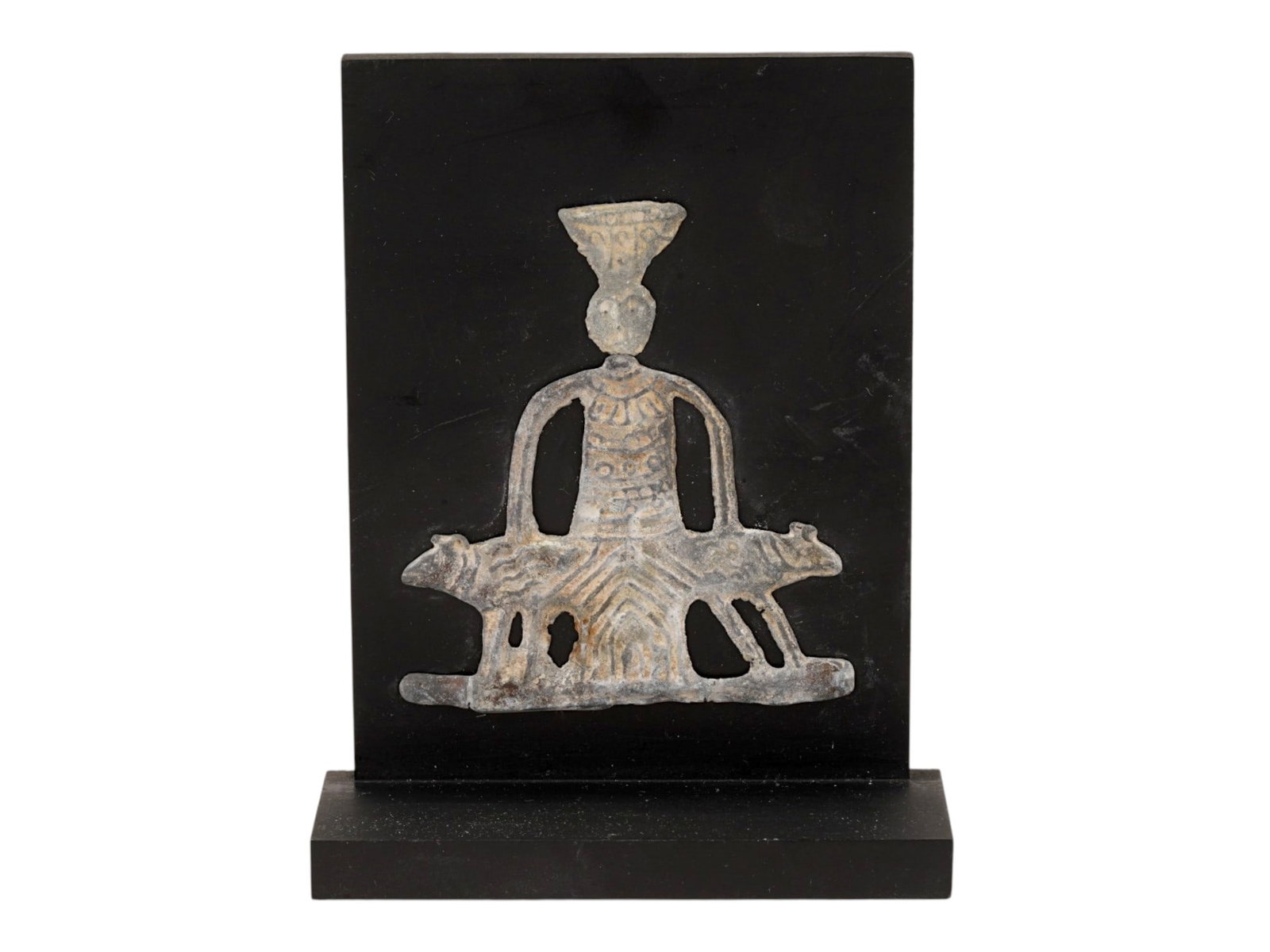ANCIENT ROMAN VOTIVE PLAQUE JUPITER HELIOPOLITANUS: An ancient Roman votive plaque depicting Jupiter Heliopolitanus, dating approximately from 200 BC to 200 AD and presented on a stand. The composition features the deity associated with the great templ