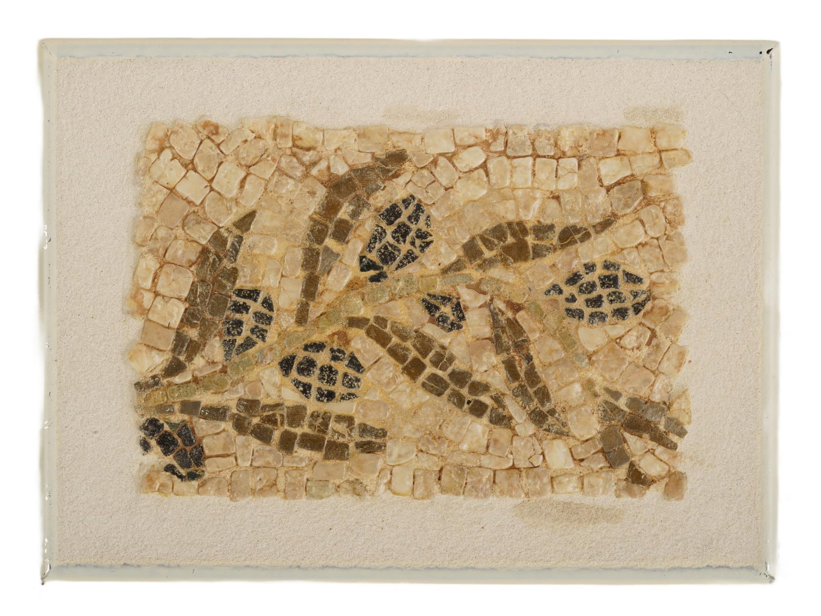 ANCIENT ROMAN OLIVE BRANCH STONE MOSAIC 100 TO 300 AD: An ancient Roman mosaic artwork composed of tesserae pieces dating circa 100 to 300 AD. The mosaic depicts an olive branch. Mosaics such as this were often used to adorn the floors and walls of Roman 
