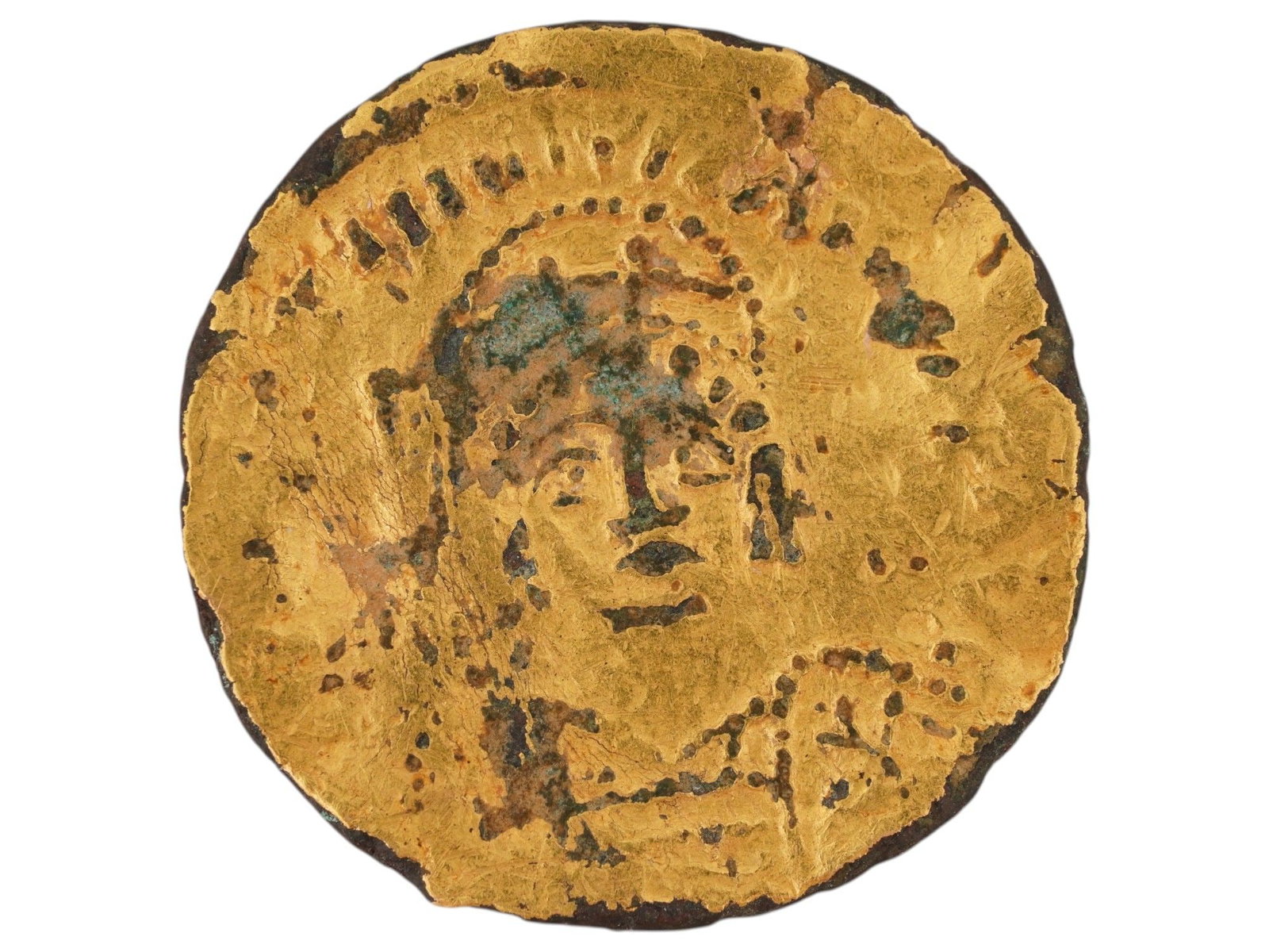 ANCIENT FORGERY OF A BYZANTINE GOLD OVER BRONZE COIN: A rare ancient forgery of a Byzantine gold coin, dating circa 400 to 600 AD, crafted in the classic technique with a foil of gold applied over a bronze core. Such deceptive issues imitated official so