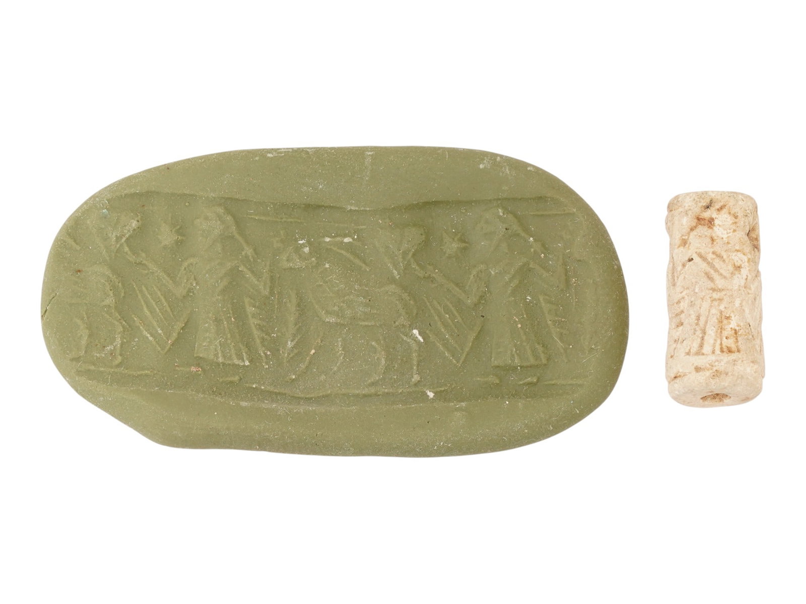 ANCIENT HOLY LAND CYLINDER SEAL BEAD W RITUAL IMAGE: An ancient Holy Land cylinder seal bead with an engraved image featuring a ritual. Circa the 1st millennium BC. Collectible Historical Artifacts, Archaeological Finds And Relics, and Carved Ritual Fig
