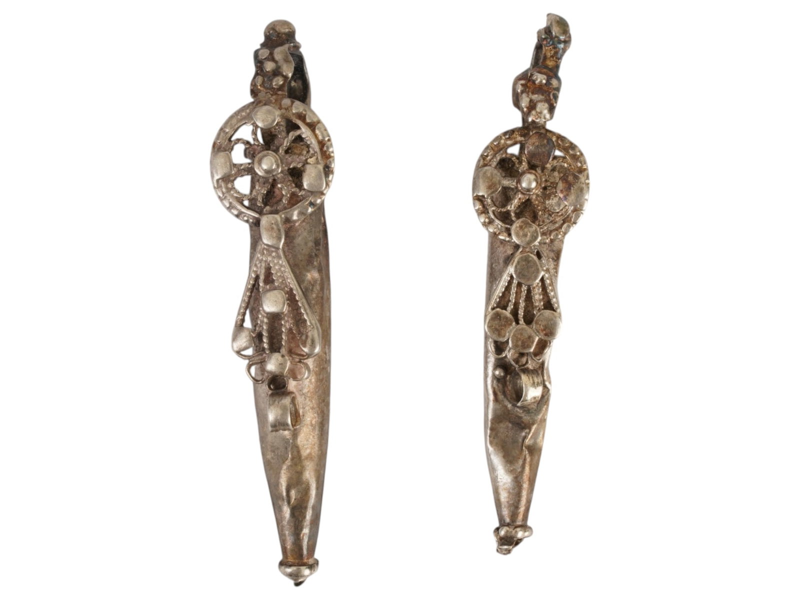 TWO ANCIENT BYZANTINE SILVER PENDANTS 400 TO 600 AD: A lot of two ancient Byzantine silver conical pendants. Circa 400 to 600 AD. Each pendant features a distinctive elongated conical shape. They are adorned with a central circular wheel element at the 