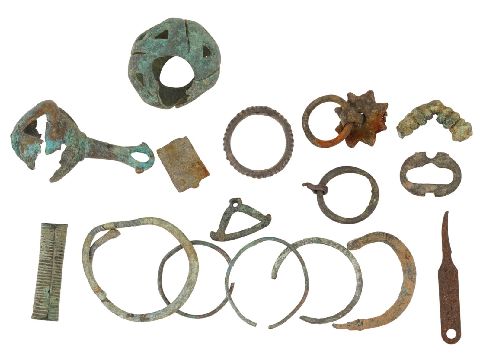 LOT OF ANCIENT BRONZE JEWELRY PIECES 1ST MILLENNIUM BC: A collection of ancient artifacts likely bronze jewelry. The items include bracelets, rings, and pendants, some of which may have been worn as luxury items. The collection includes several open and cl