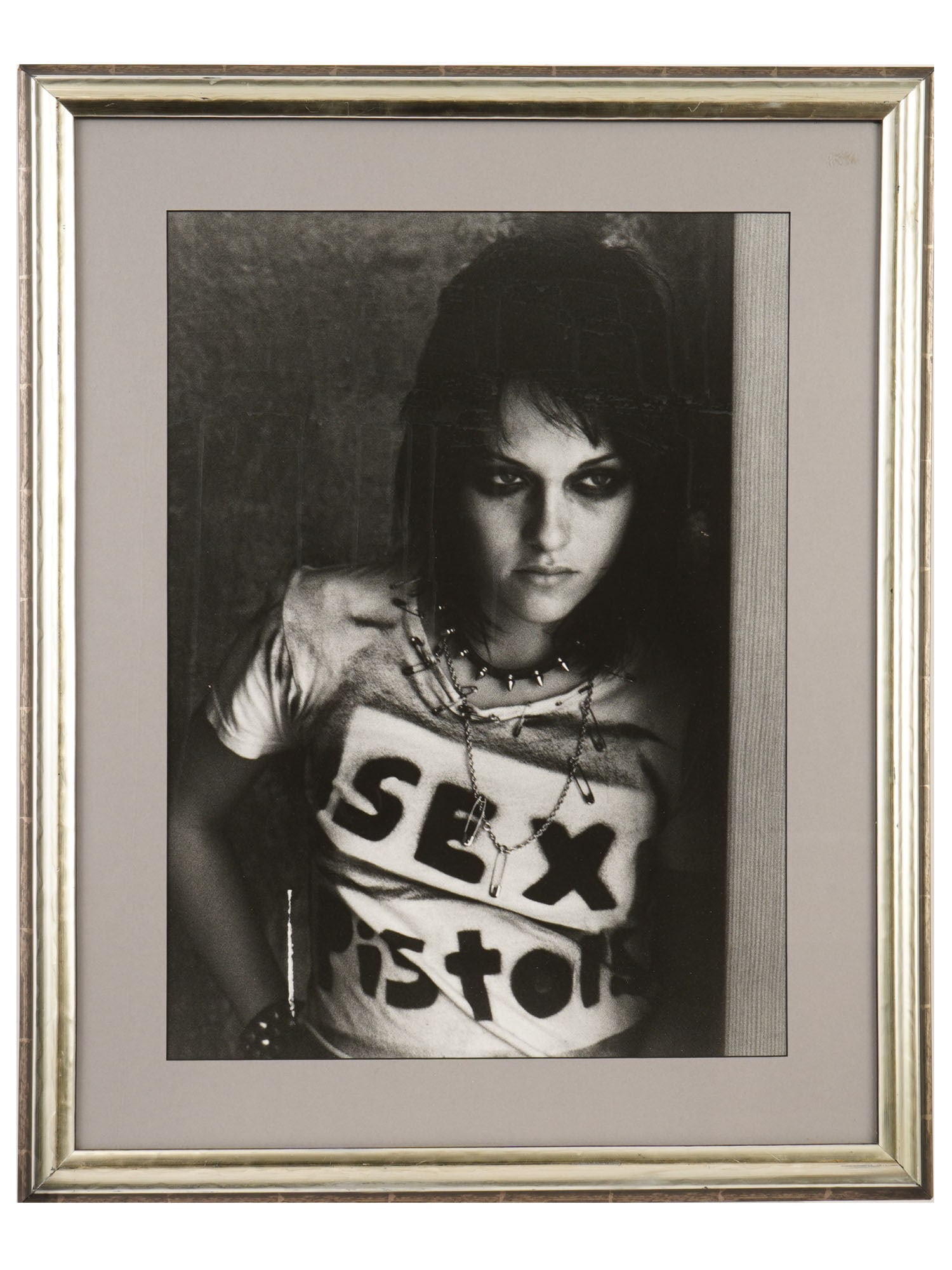 AMERICAN KRISTEN STEWART AS JOAN JETT PHOTOGRAPH: An American portrait of Kristen Stewart photograph. The photograph depicts actress Kristen Stewart as legendary rock musician Joan Jett. It was taken for the 2010 film The Runaways, which tells the st