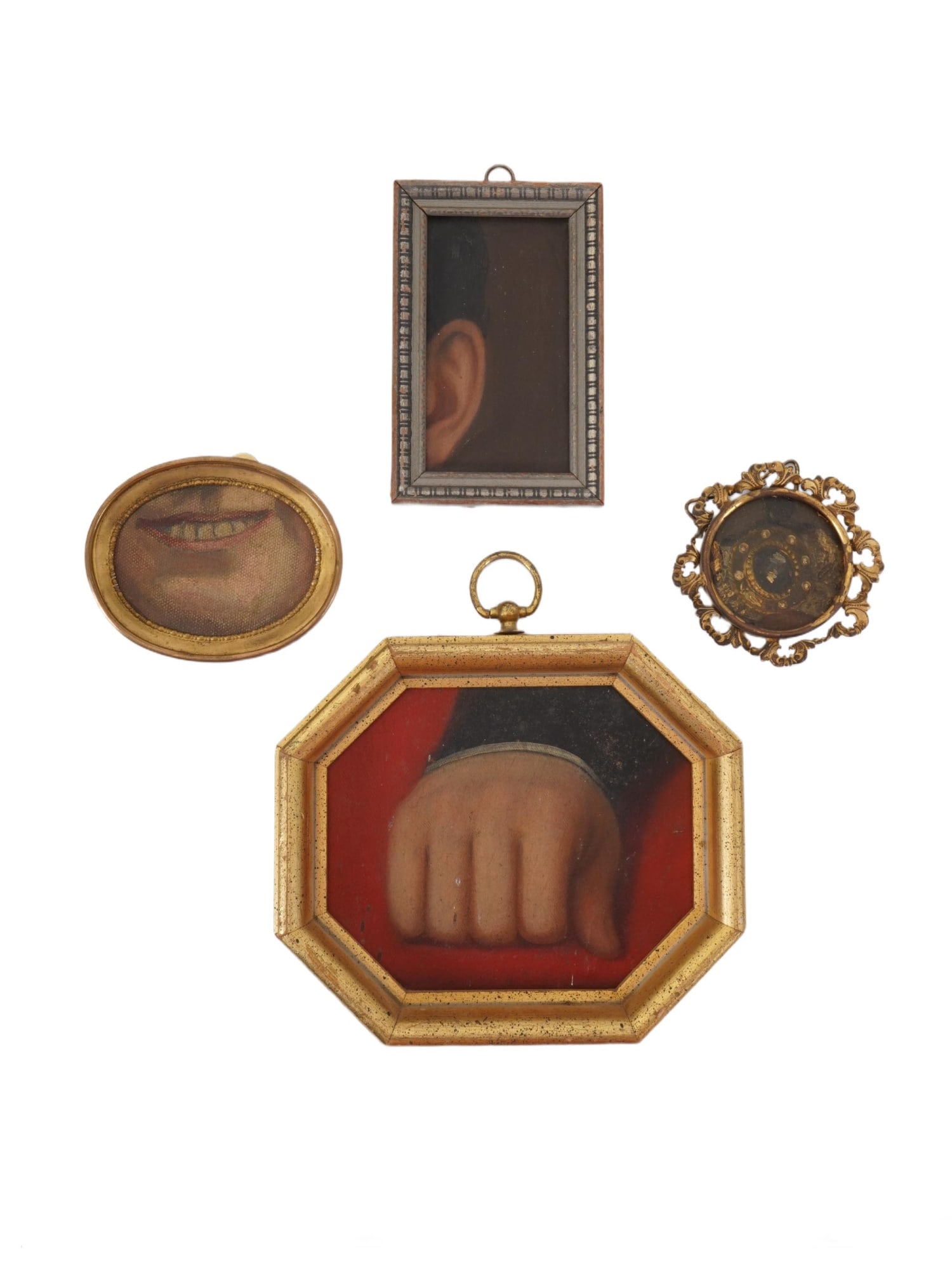 GROUP OF FOUR MINIATURE WORKS INDIVIDUAL BODY PARTS: A group of four miniature framed works, depicting individual body parts and considered collectible examples of mid-19th-century ephemera. The lot includes a small rectangular frame with an image of an
