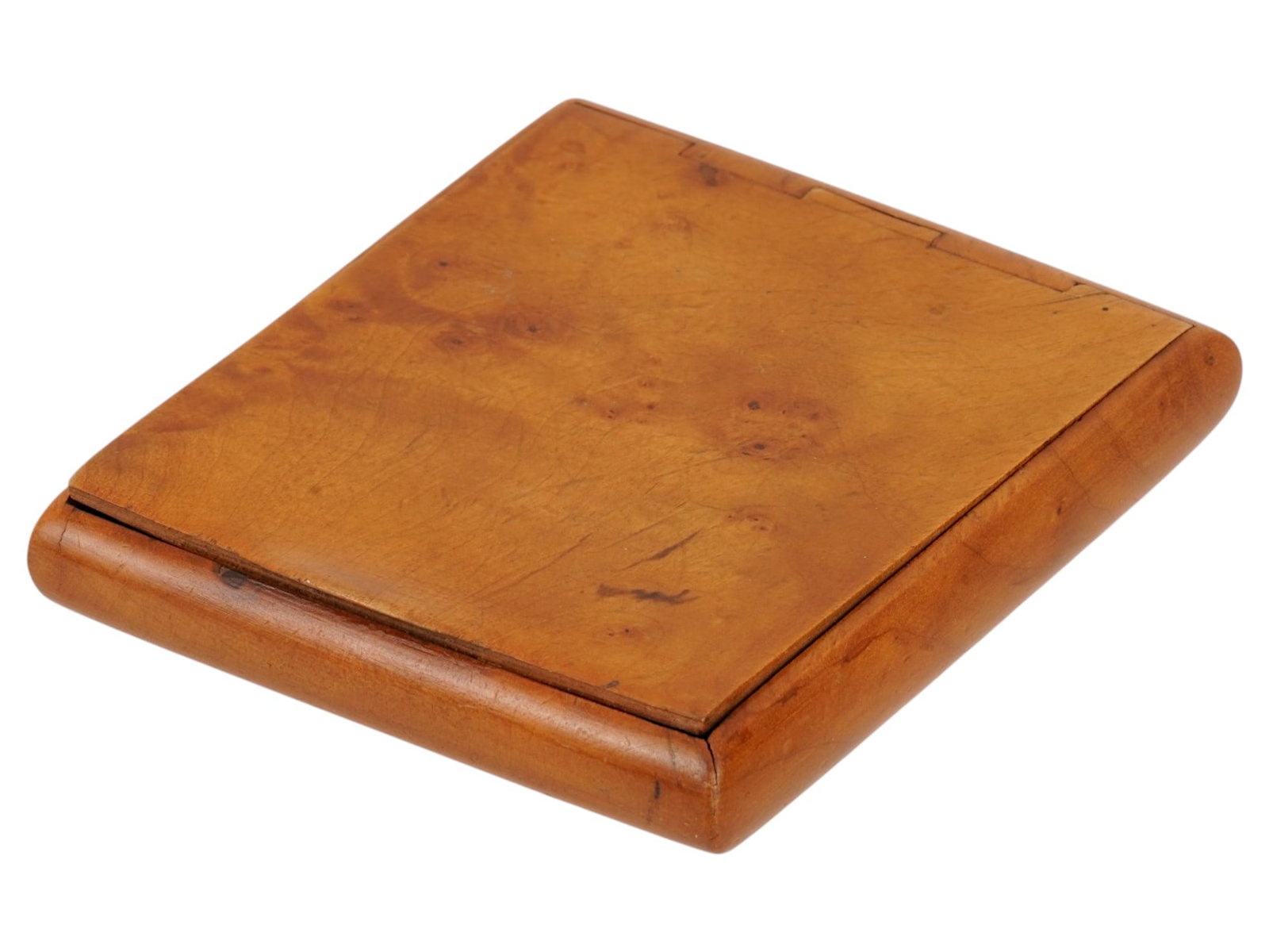 RUSSIAN SOVIET ERA KARELIAN BIRCH WOOD CIGARETTE CASE: A Russian Soviet era carved Karelian birch cigarette case with hinged lid. Unmarked. Collectible Wood Carvings, Decor, Tobacciana Accessories. THIS LOT IS ELIGIBLE FOR A 30-DAY UNCONDITIONAL R