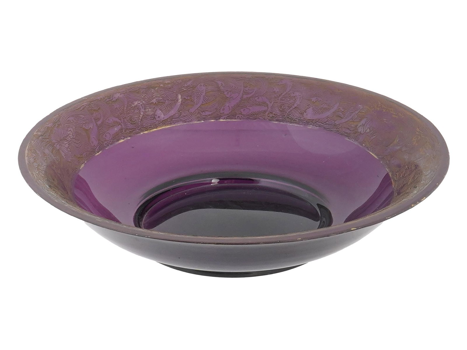 CZECHOSLOVAKIAN GILDED PURPLE GLASS BOWL MARKED: A Czechoslovakian footed purple glass bowl. The interior od the bowl is adorned with a gilded etched glass design representing a fish motif. Marked with etching, made in Czechoslovakia and probably in