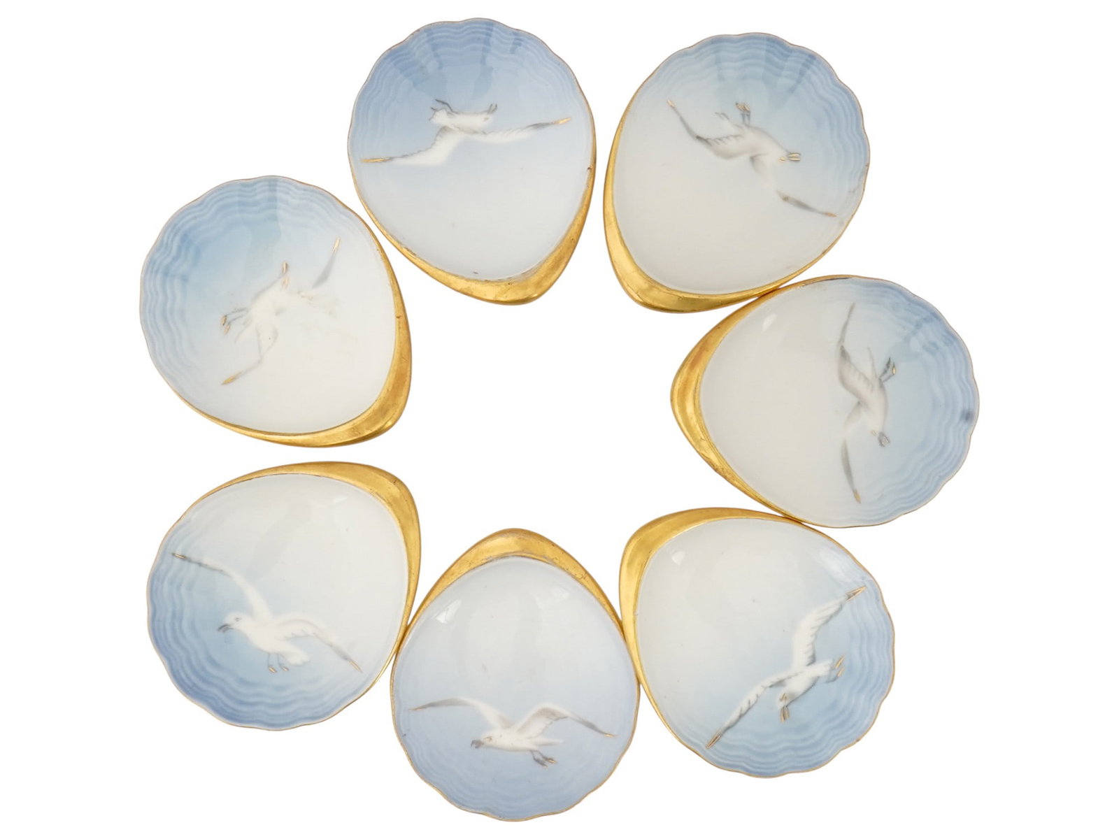 LOT OF DANISH BING GRONDAHL SEAGULL PORCELAIN BOWLS: A collection of seven porcelain butter bowls from the famous Seagull collection by the Danish manufacturer Bing and Grondahl. This series was designed by Fanny Garde in 1892 and remained in production