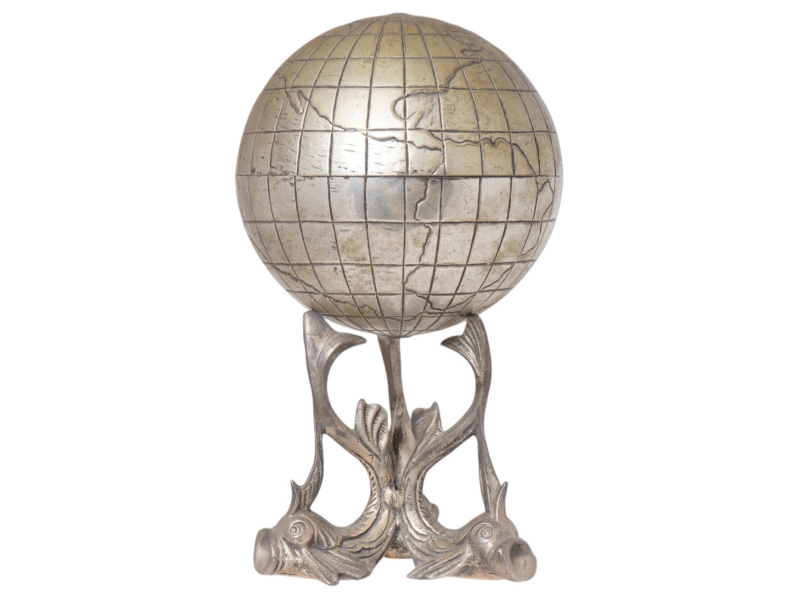 BRASS DECORATIVE TABLE GLOBE ON FIGURAL FISH STAND: A brass decorative table globe made in antique style. The globe is mounted on an unusual figural base that resembles the intertwined tails of fish or dolphins. The ware is engraved with detailed ornam