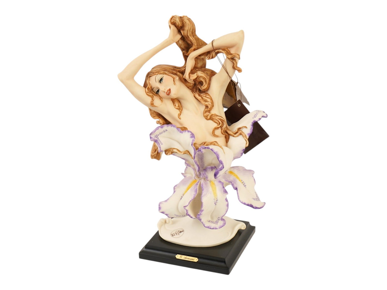 ITALIAN COMPOSITE FEMALE FIGURINE DESIGNED BY ARMANI: A collectible composite figurine called Awakening created by the famous Italian sculptor Giuseppe Armani. This was the first figurine released exclusively for members of the Armani Collectors Society 