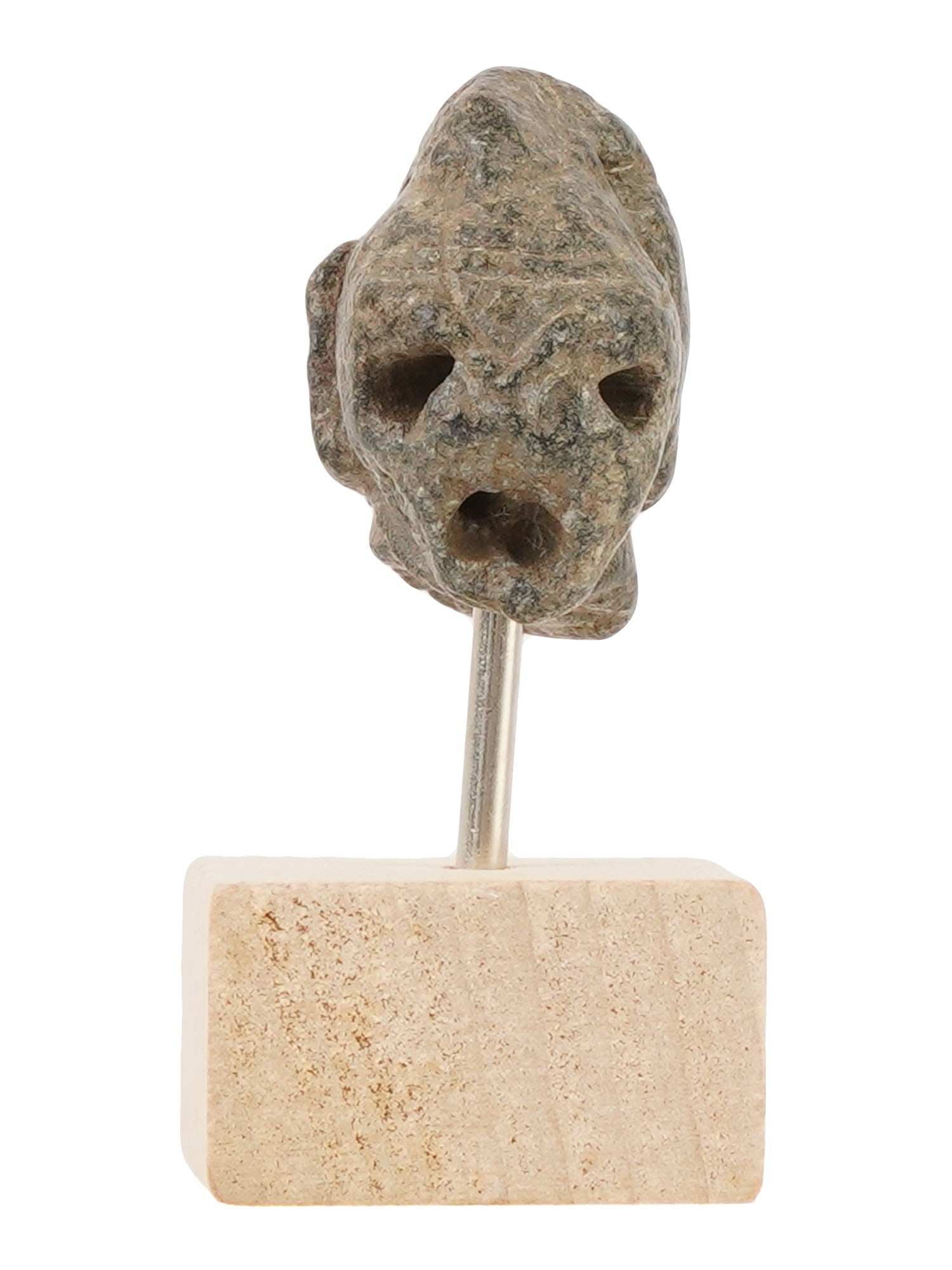 ANCIENT NEAR EASTERN CARVED STEATITE GLADIATOR HEAD: An ancient Near Eastern carved steatite head fragment of a gladiator wearing a helmet, ca. 1st millennium BC. Mounted on a stand. Ancient Roman Carved Sculptures And Historical Collectibles. TH