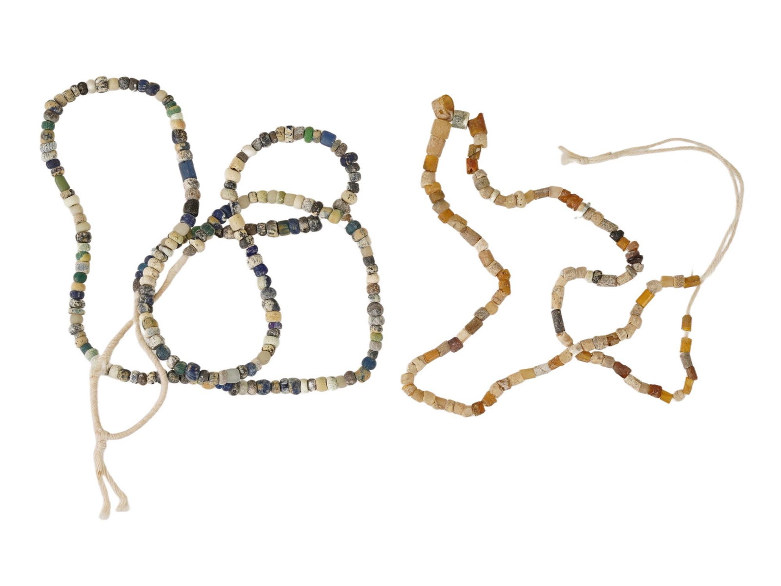 LOT OF ANCIENT ROMAN GLASS BEAD NECKLACES 100 TO 300 AD: A lot of two ancient Roman necklaces crafted from multicolored glass beads, dating from 100 to 300 AD. Each necklace showcases a range of bead colors and shapes, reflecting the Roman eras intricate gl