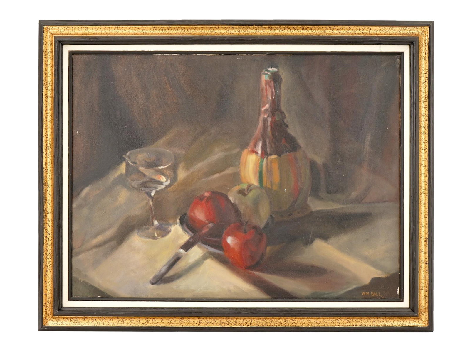 FRUIT STILL LIFE OIL PAINTING SIGNED BY THE ARTIST: A Modernist oil painting on canvas depicting a still life with apples, a glass, a bottle, and a knife. Signed by the artist, WM Saul and dated 85, lower right. Framed. Additionally inscribed, on the b