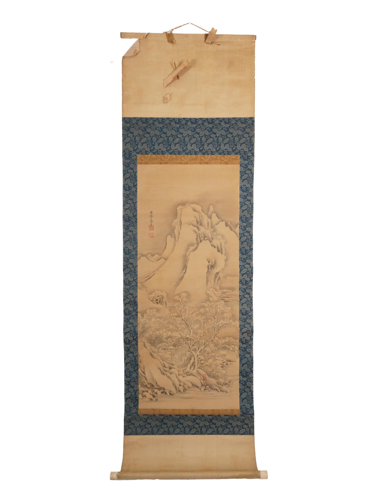 ANTIQUE CHINESE INK LANDSCAPE PAINTING ON SILK SCROLL: An antique Chinese ink painting on silk scroll depicting a scene in a mountain landscape. Inscribed with Calligraphy, and an iron red seal, upper left and lower to the center. Antique and Vintage Asia