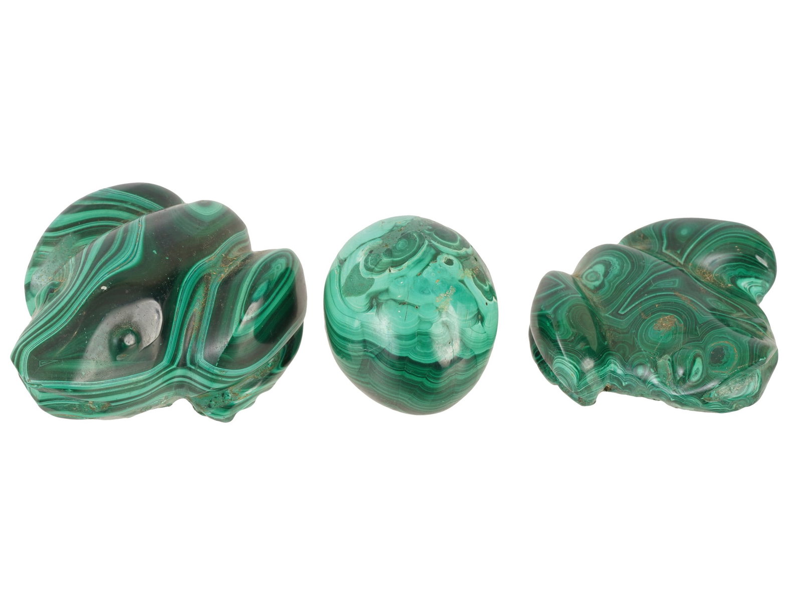 RUSSIAN CARVED AND POLISHED MALACHITE FIGURINES: A lot of three Russian carved and polished malachite figurines. Two of the three figures are modeled after sitting frogs, and one is shaped like an egg. The figures can be used as paperweights. Antiqu