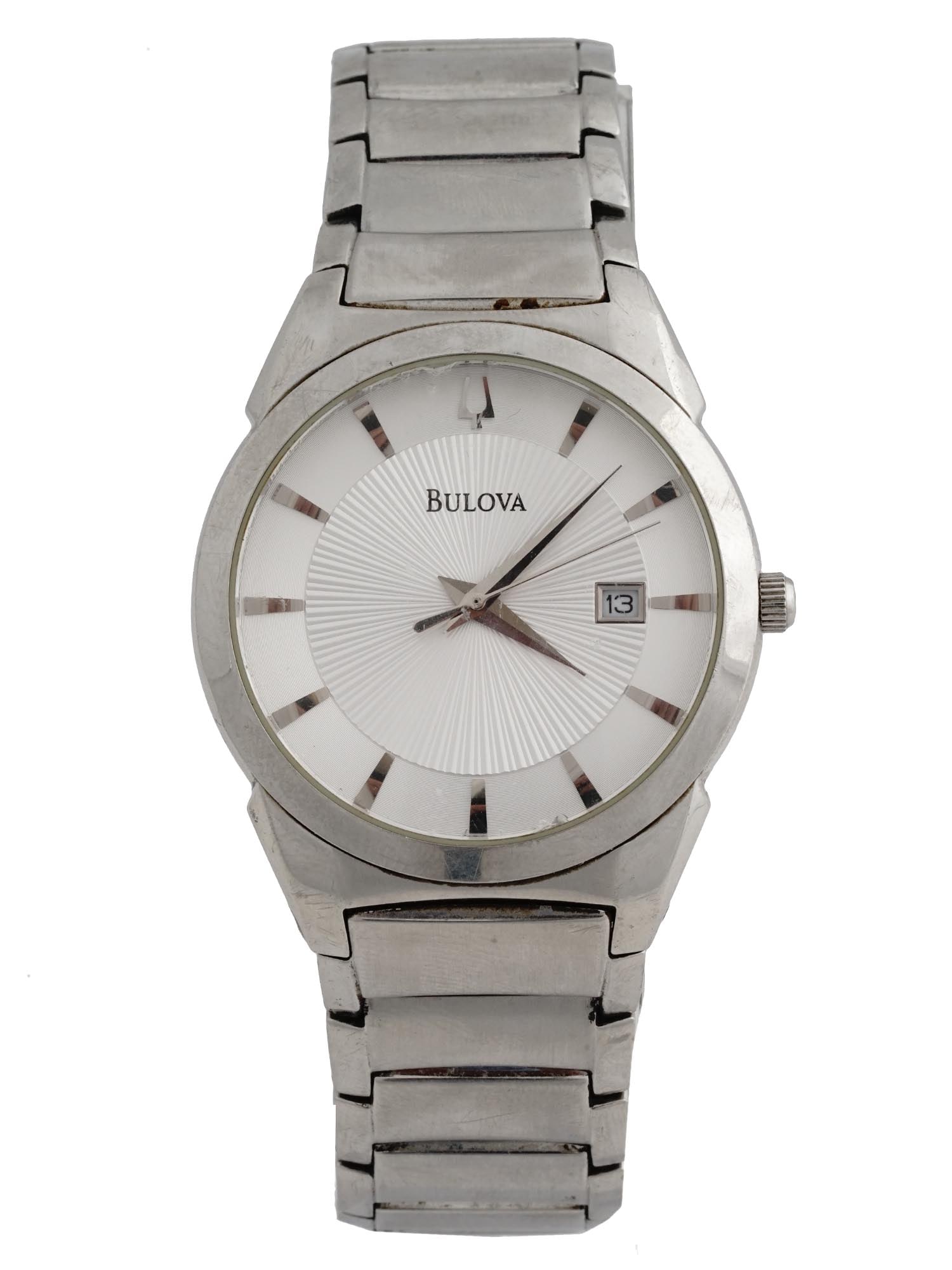 VINTAGE BULOVA CLASSIC STAINLESS STEEL WRISTWATCH: A vintage stainless steel mens analog wristwatch by Bulova. Model 96B015. Japanese quartz movement. Round bezel with single crown, white guilloche dial with silver baton index, date window and hallmar