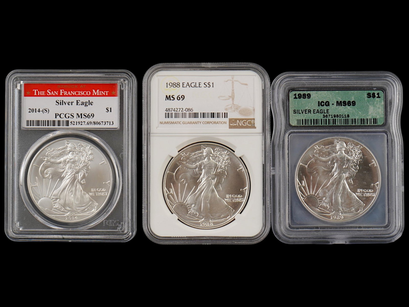 THREE VINTAGE AMERICAN SILVER EAGLE COINS GRADED (1 of 4)