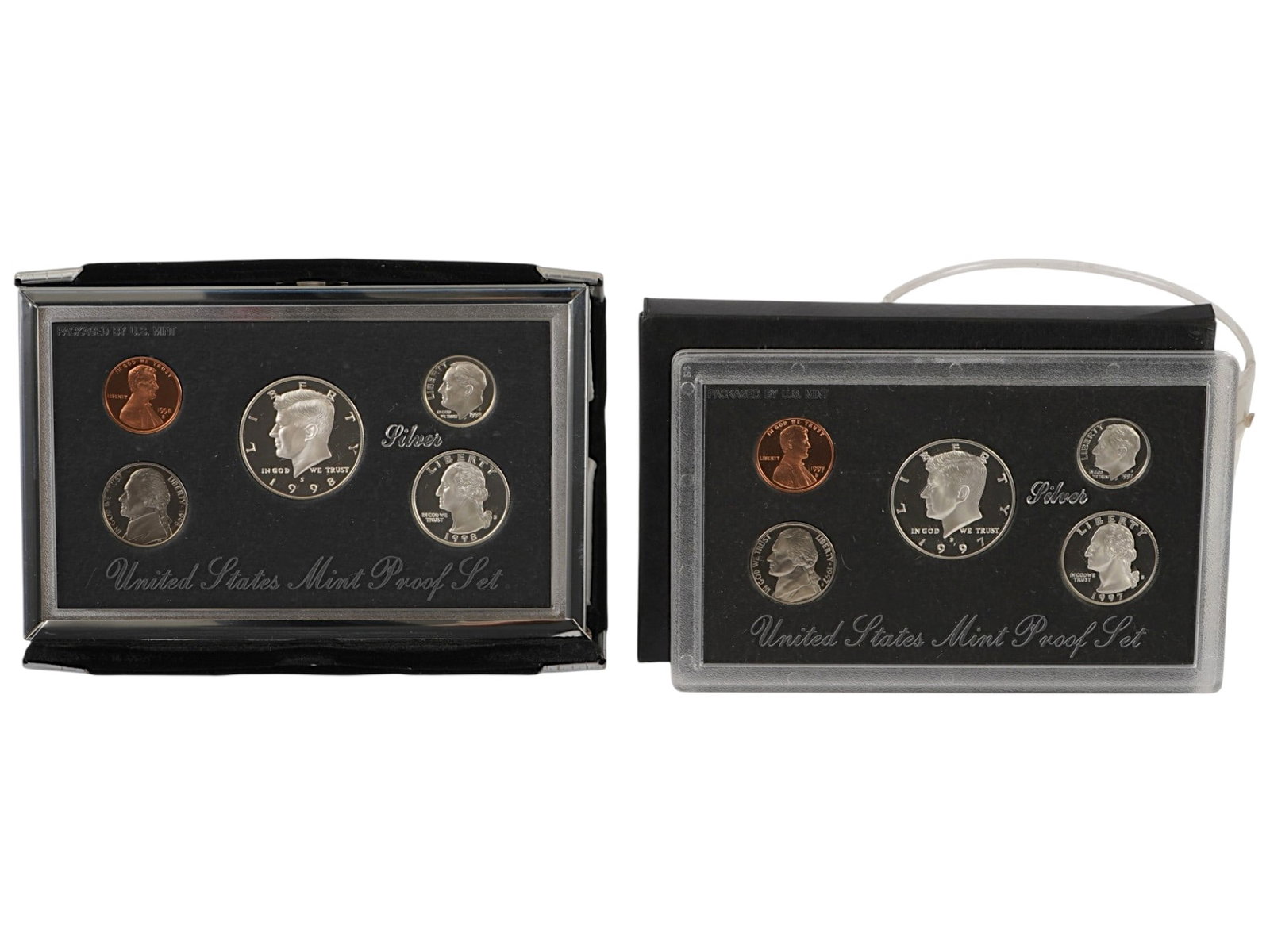 1997 AND 1998 UNITED STATES MINT SILVER PROOF SETS: A collection of two United States Mint silver proof sets from 1997 and 1998, including one Premier Silver Proof Set, both preserved in their original Mint packaging with accompanying Certificates of A
