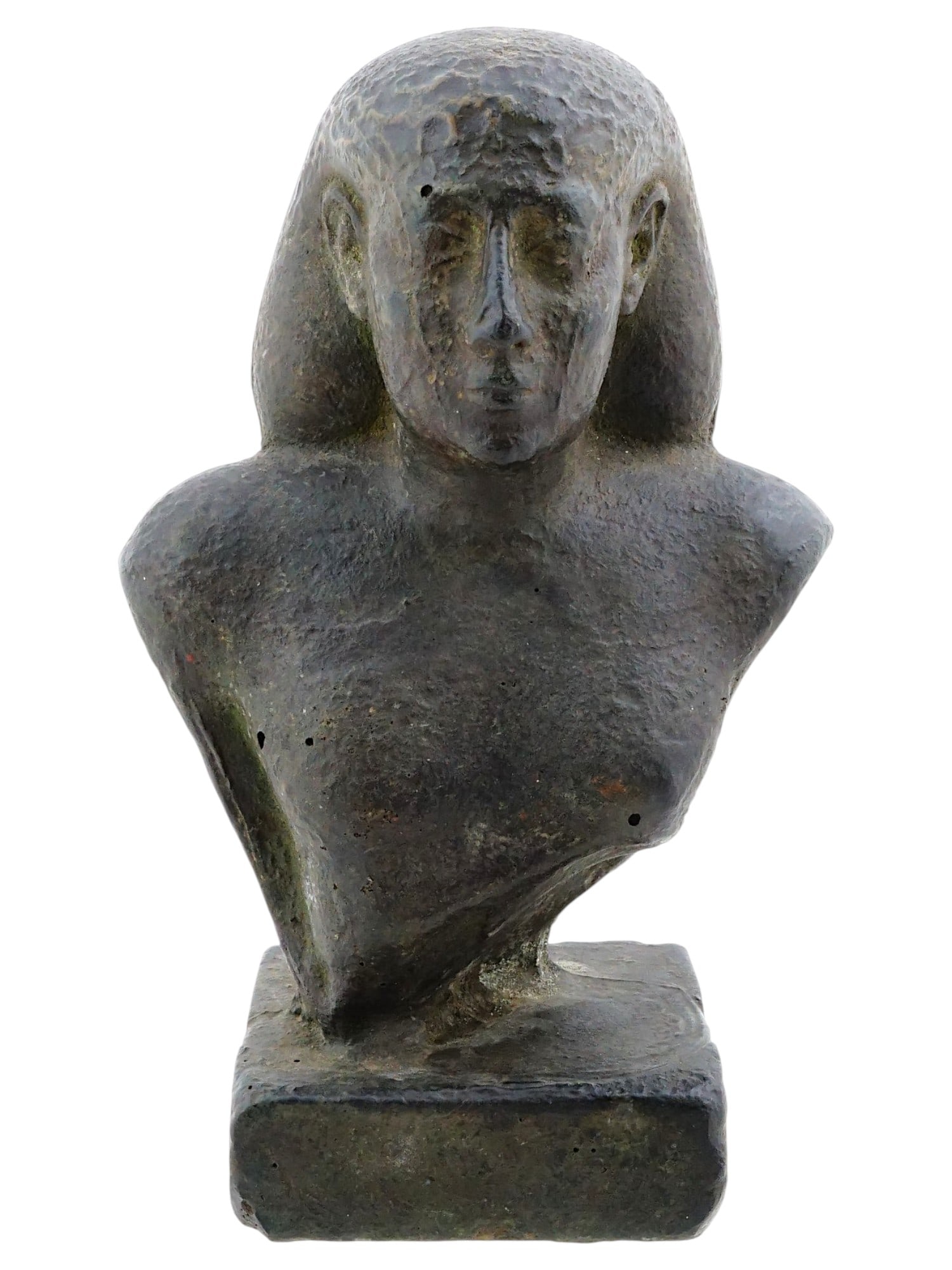 LATE PERIOD STYLE EGYPTIAN CARVED BUST OF NOBLEMAN: A Egyptian carved stone bust of a nobleman or official, executed in the traditional style of the Late Period. The figure is depicted wearing a classic sleek three piece wig that leaves the ears comple