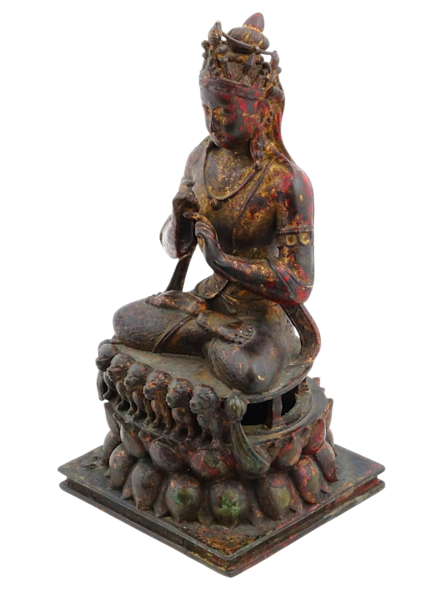 ASIAN PATINATED BRONZE STATUE OF BUDDHA VAIROCANA: A patinated bronze statue of Buddha Vairocana also known as Mahavairocana wearing a crown. The figure holds his hands in front of his chest in the Bodhyagri mudra fist of wisdom gesture, with the inde