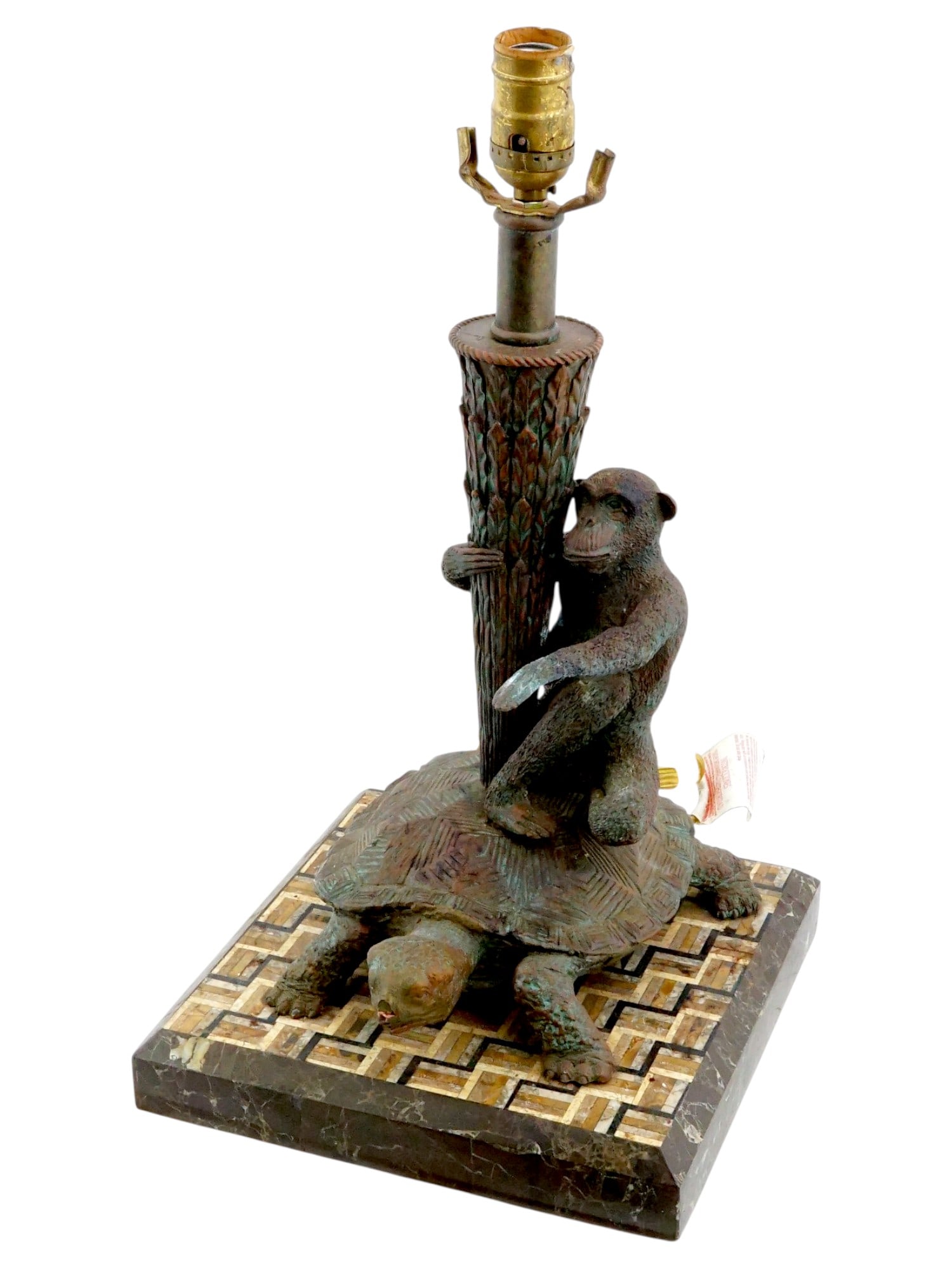 MAITLAND-SMITH BRONZE AND MARBLE JUNGLE TABLE LAMP: A vintage table lamp by Maitland-Smith, a furniture and decor company active since 1979. Made in the Philippines. Marble base with a marquetry top motif. Cast bronze turtle and monkey figurines hold t