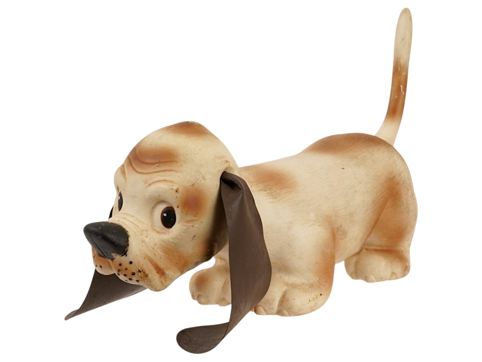 ARROW RUBBER EDWARD MOBLEY DOG RUBBER SQUEAKY TOY: A vintage rubber squeaky toy, Homer the Huggable Hound. Designed by Edward Mobley. Manufactured by Arrow Rubber and Plastics Corp. Year of release: 1966. The toy depicts a hound figurine basset hound 